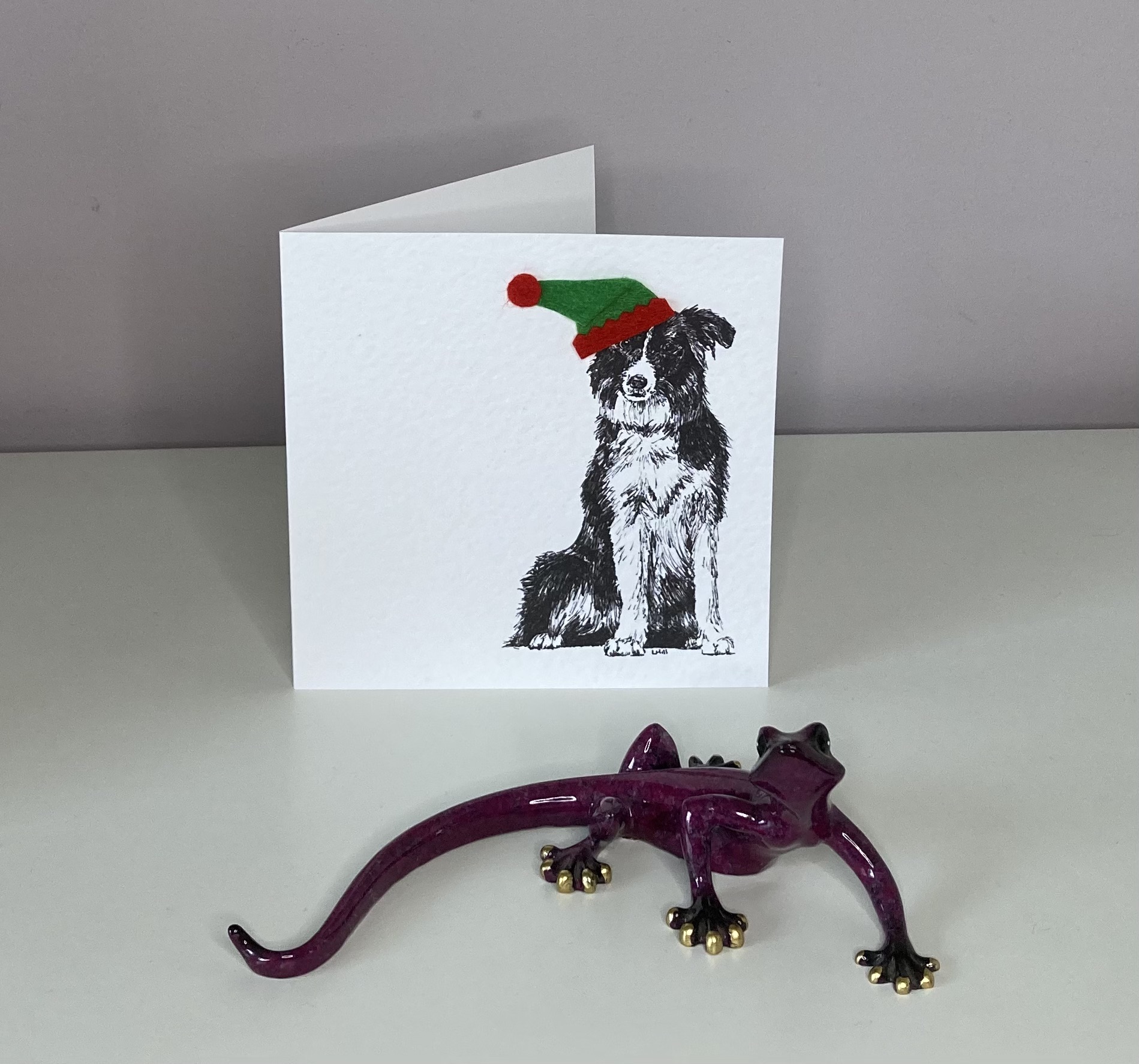 Border Collie with elf hat Christmas card by Louisa Hill