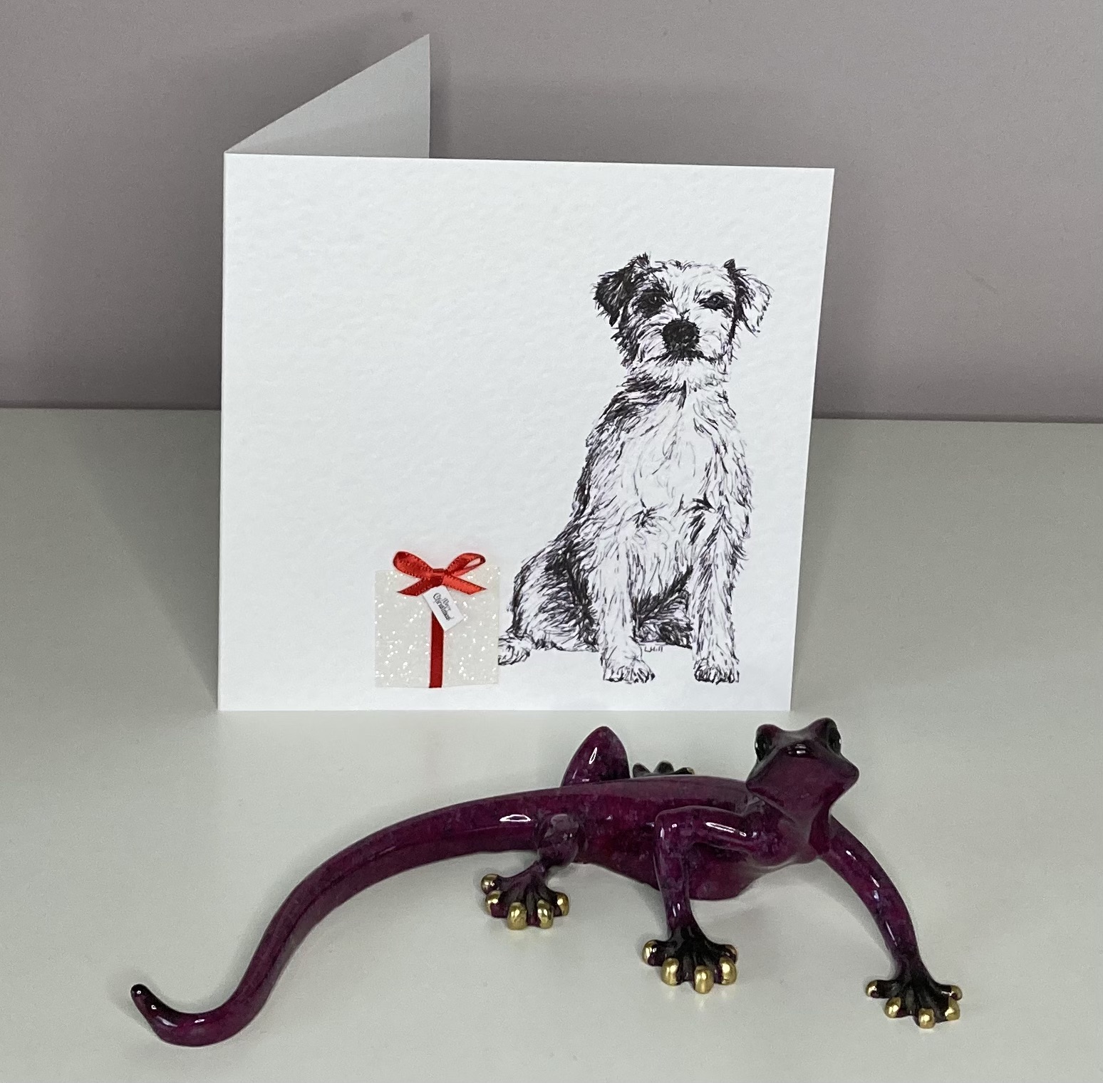 Parson Russell Terrier with Christmas present Christmas card by Louisa Hill