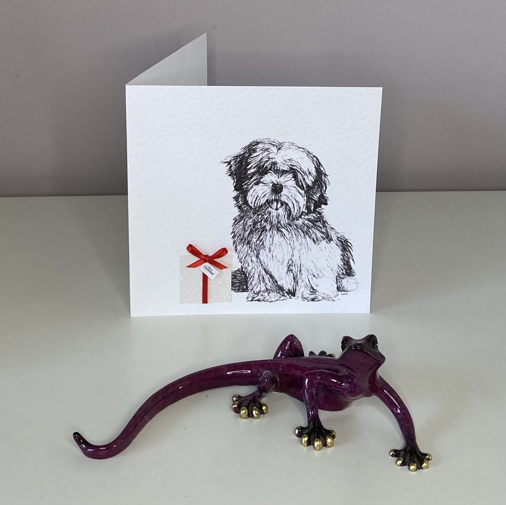 Lhasa Apso with Christmas present Christmas card by Louisa Hill