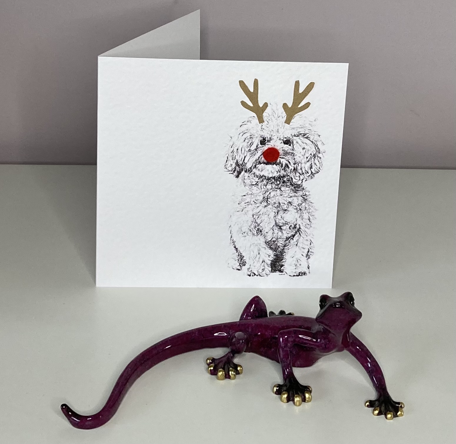 Bichon Frise with reindeer antlers and red nose Christmas card by Louisa Hill