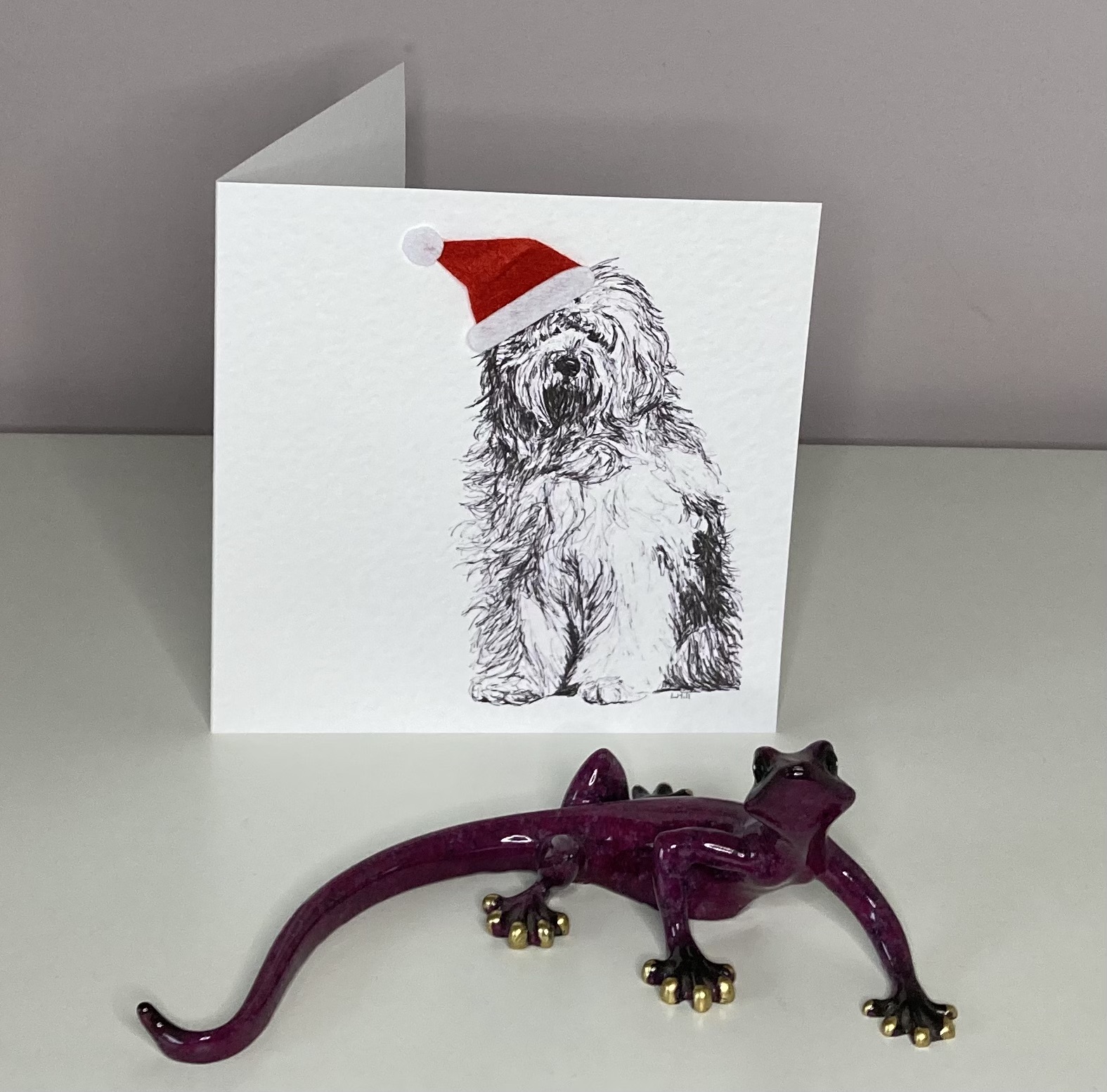 Old English Sheepdog with Santa hat Christmas card by Louisa Hill