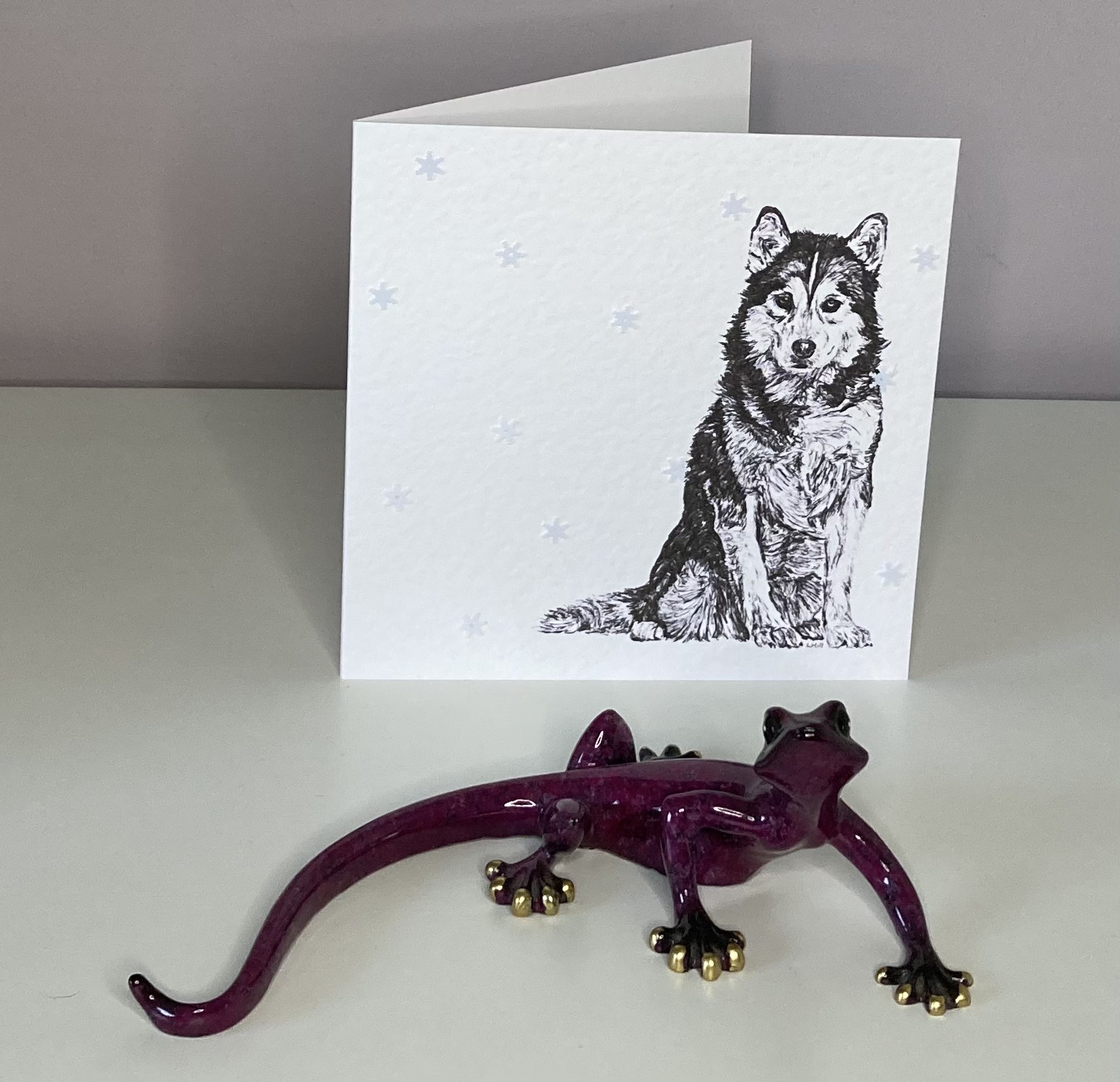 Siberian Husky with snowflakes Christmas card by Louisa Hill