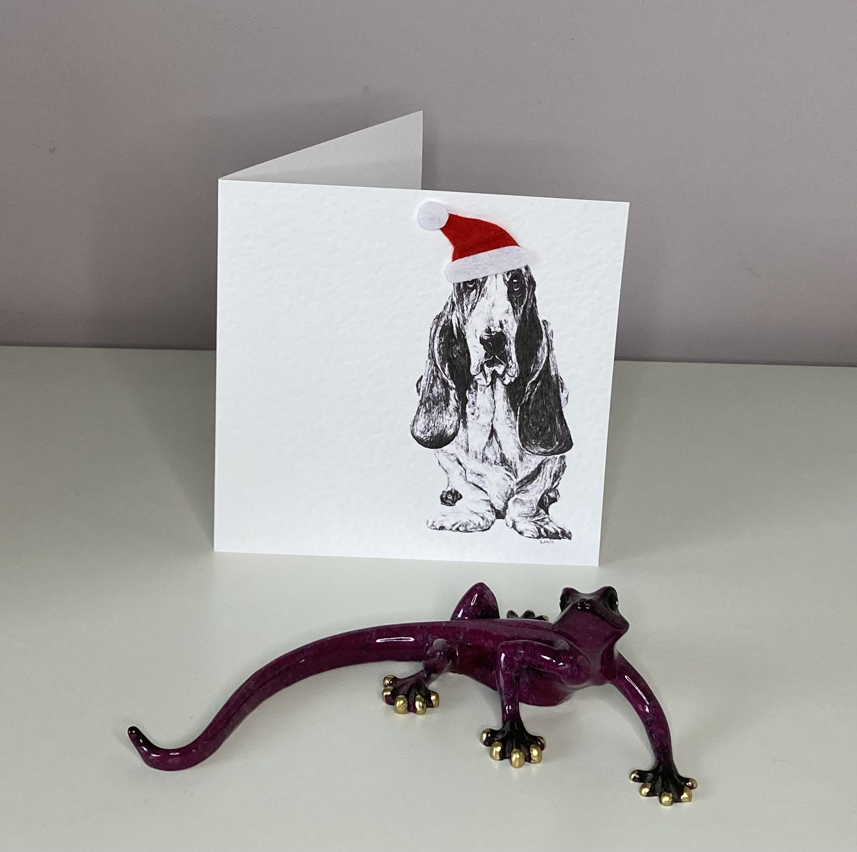 Basset Hound with Santa hat Christmas card by Louisa Hill