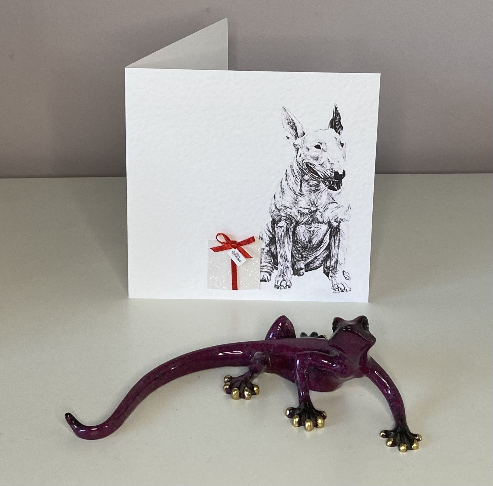 English Bull Terrier with Christmas present Christmas card by Louisa Hill