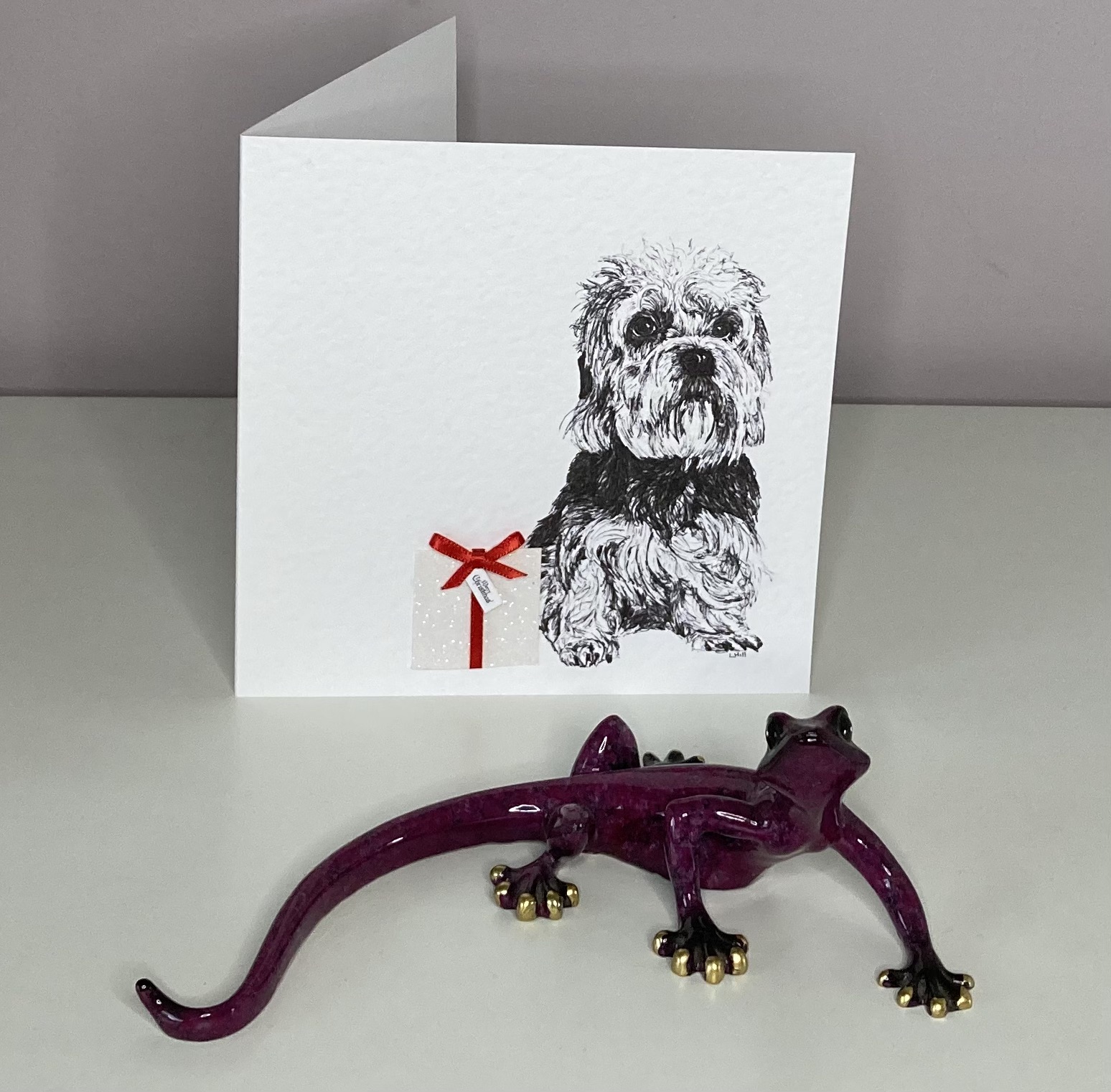 Dandie Dinmont Terrier with Christmas present Christmas card by Louisa Hill