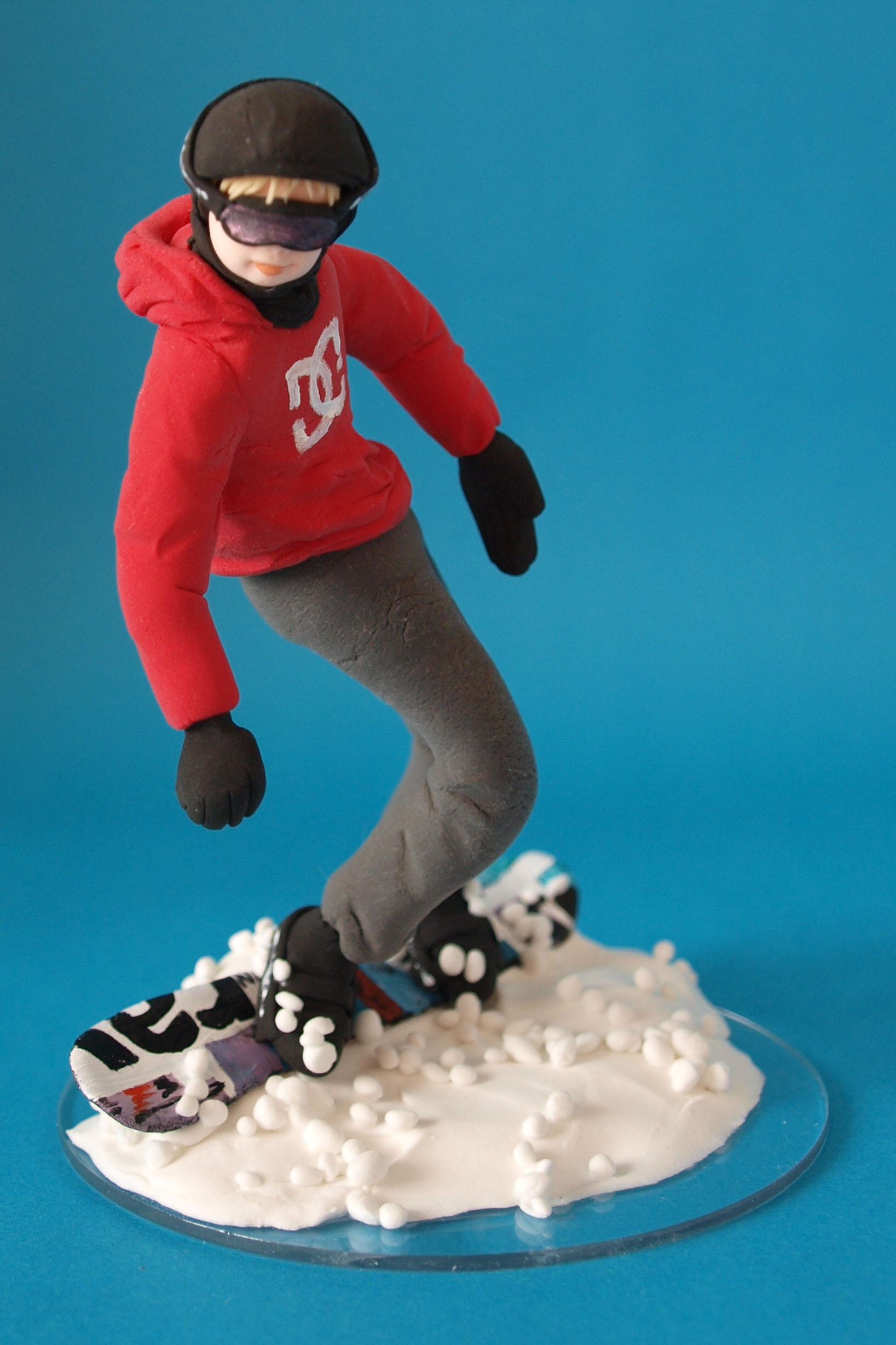 Snowboarder birthday cake topper by Louisa Hill