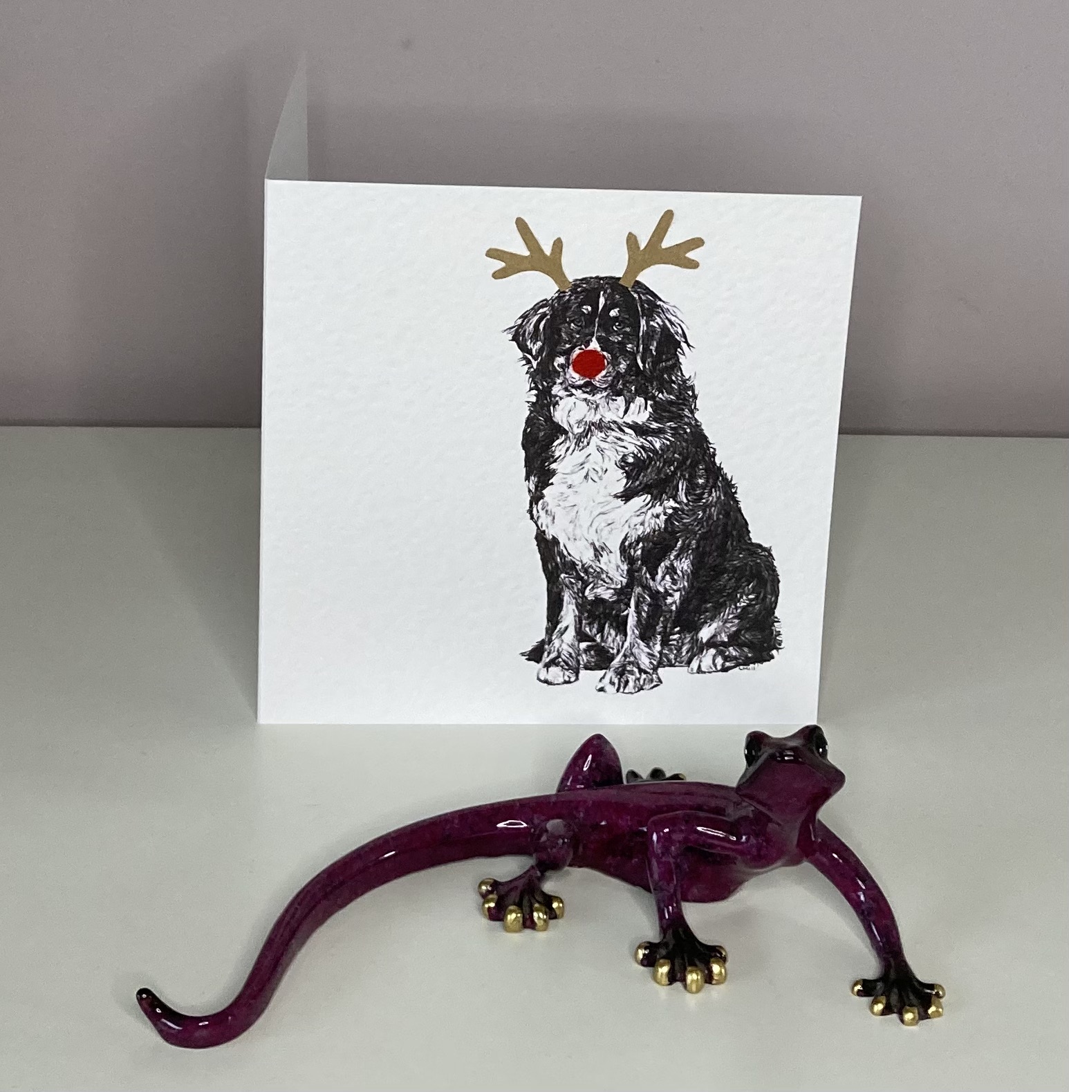 Bernese Mountain with reindeer antlers and red nose Christmas card by Louisa Hill