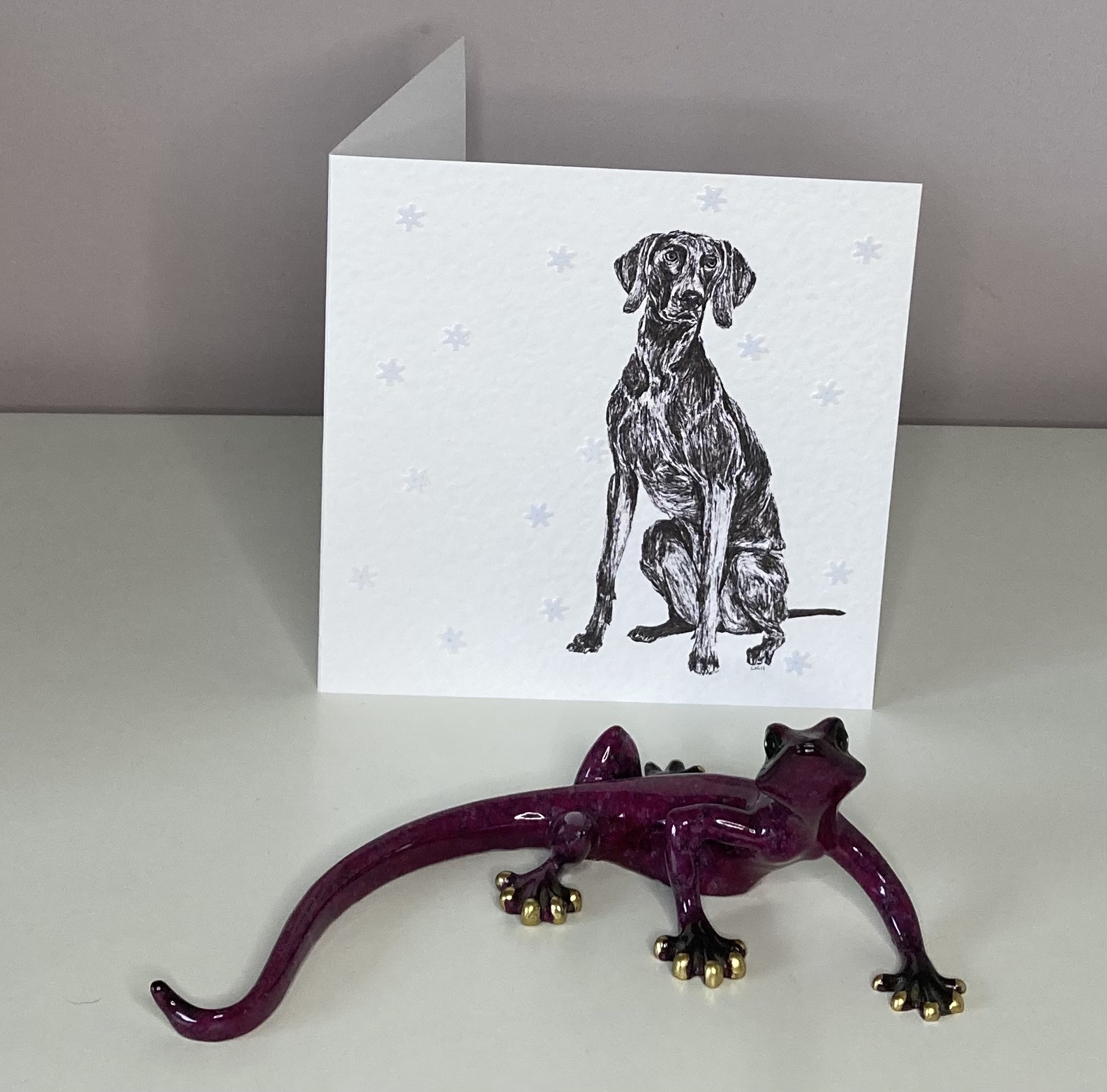 Weimaraner with snowflakes Christmas card by Louisa Hill