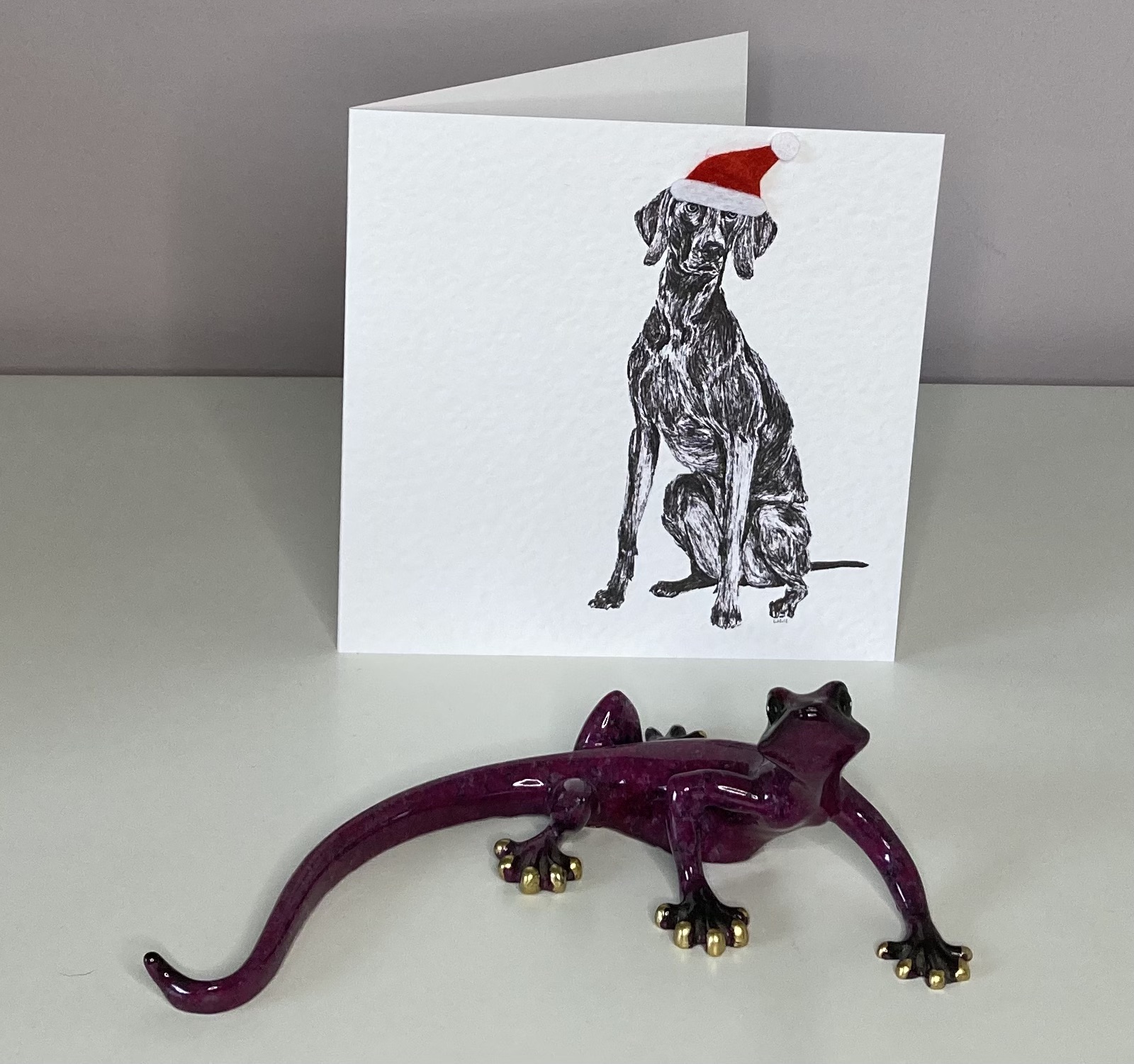 Weimaraner with Santa hat Christmas card by Louisa Hill
