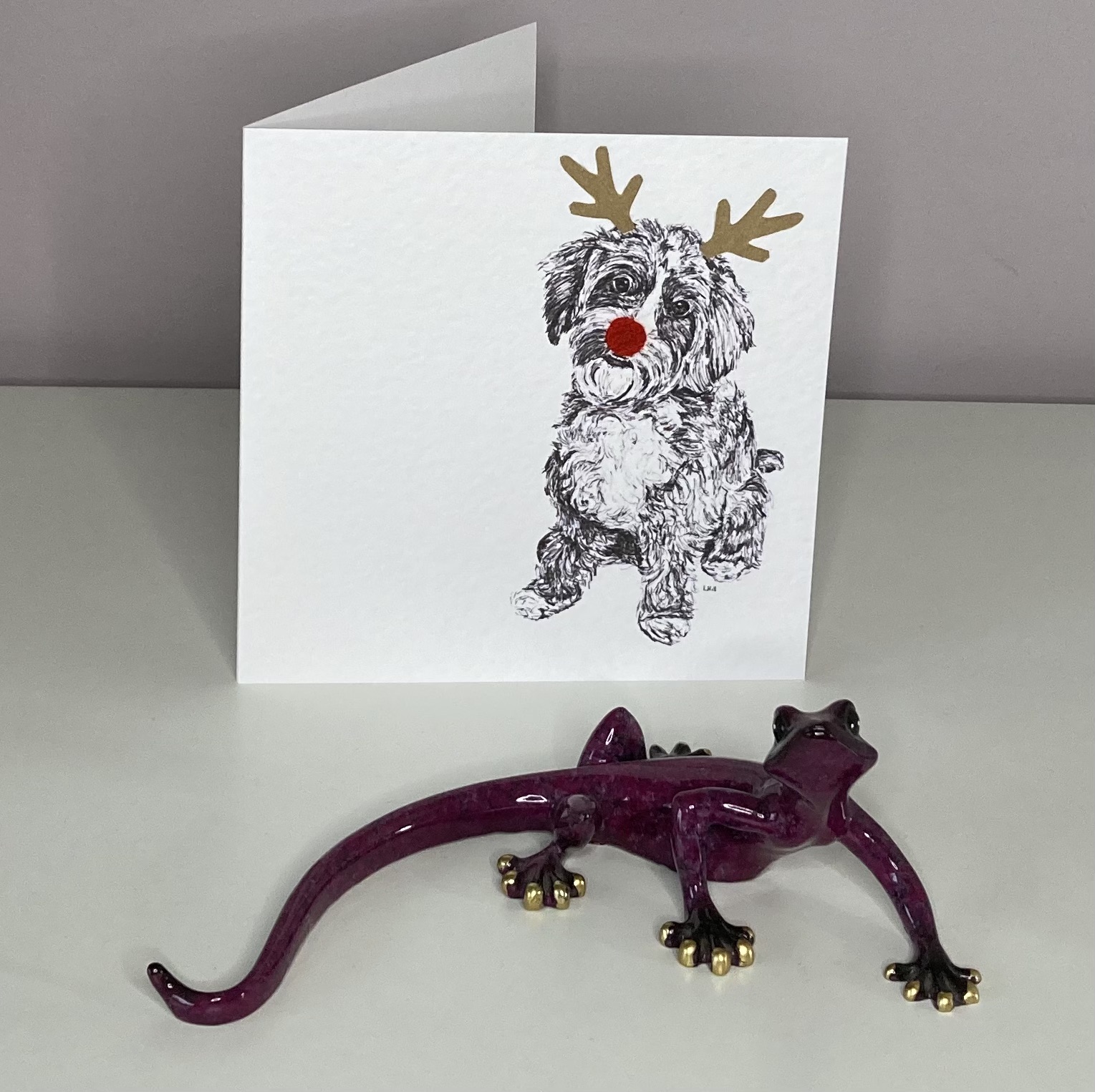 Cavapoo with reindeer antlers and red nose Christmas card by Louisa Hill