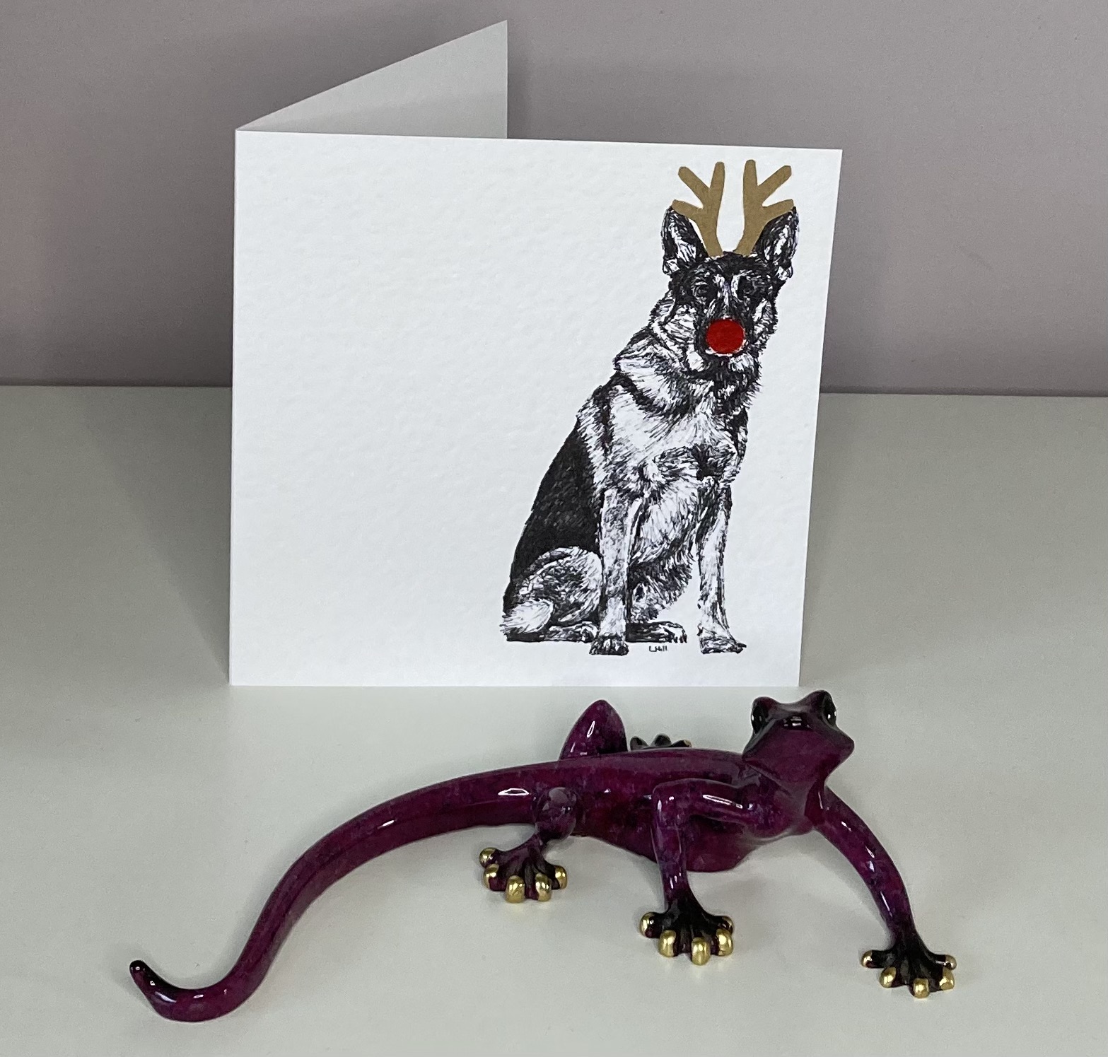 German Shepherd with reindeer antlers and red nose Christmas card by Louisa Hill