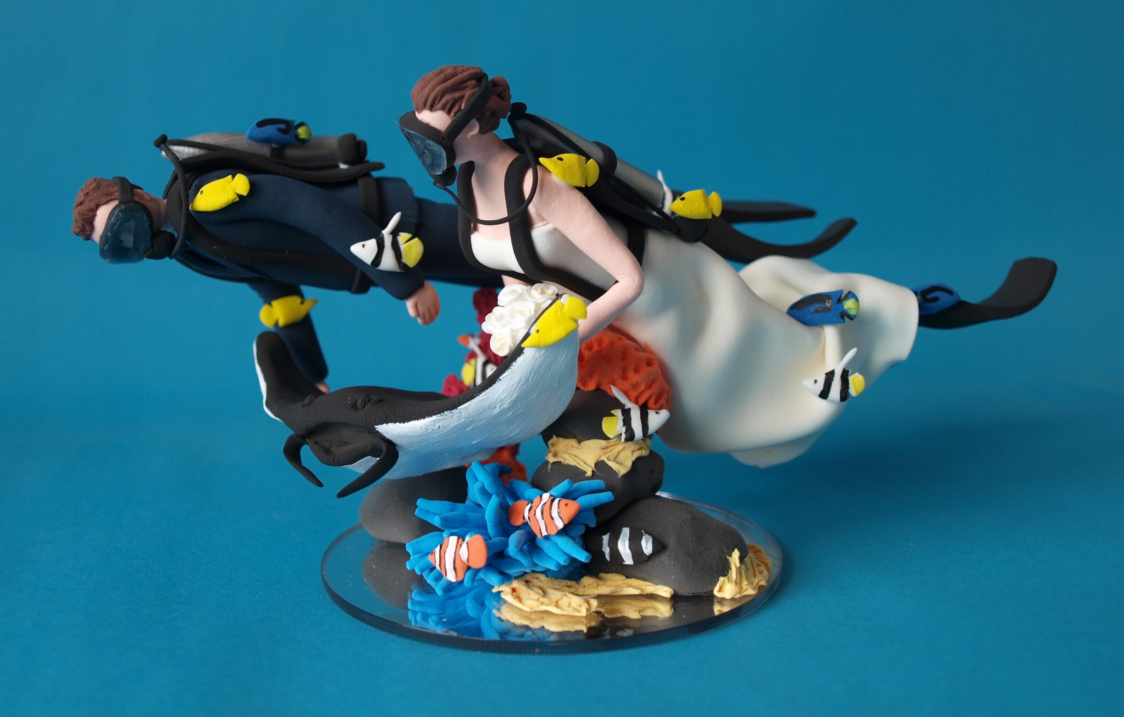 Scuba Diving Bride and groom with manta ray wedding cake topper by Louisa Hill