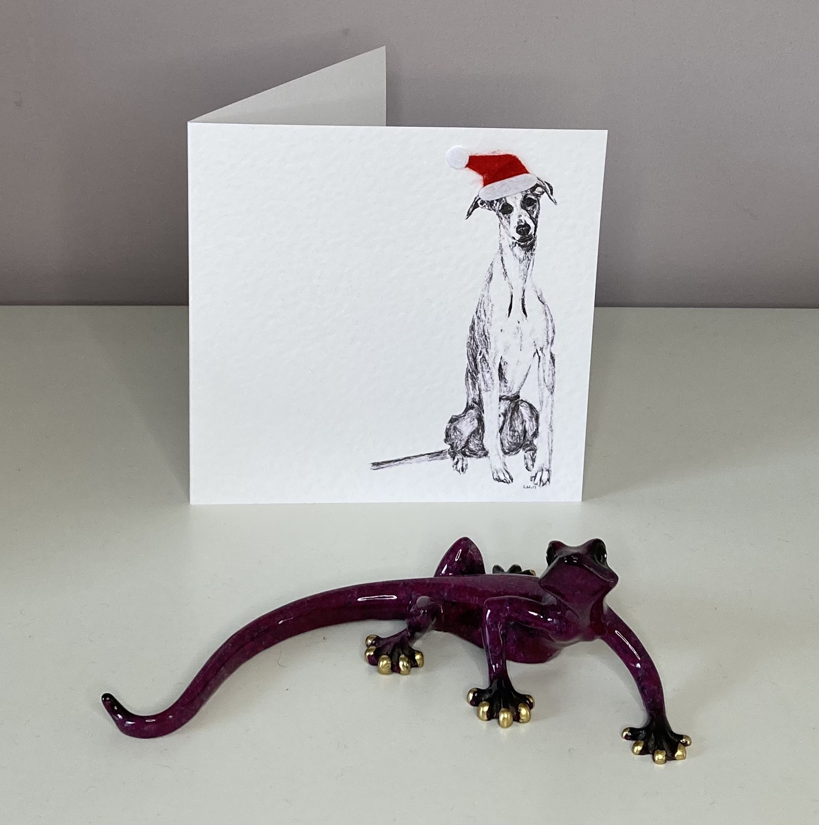 Whippet with Santa hat Christmas card by Louisa Hill