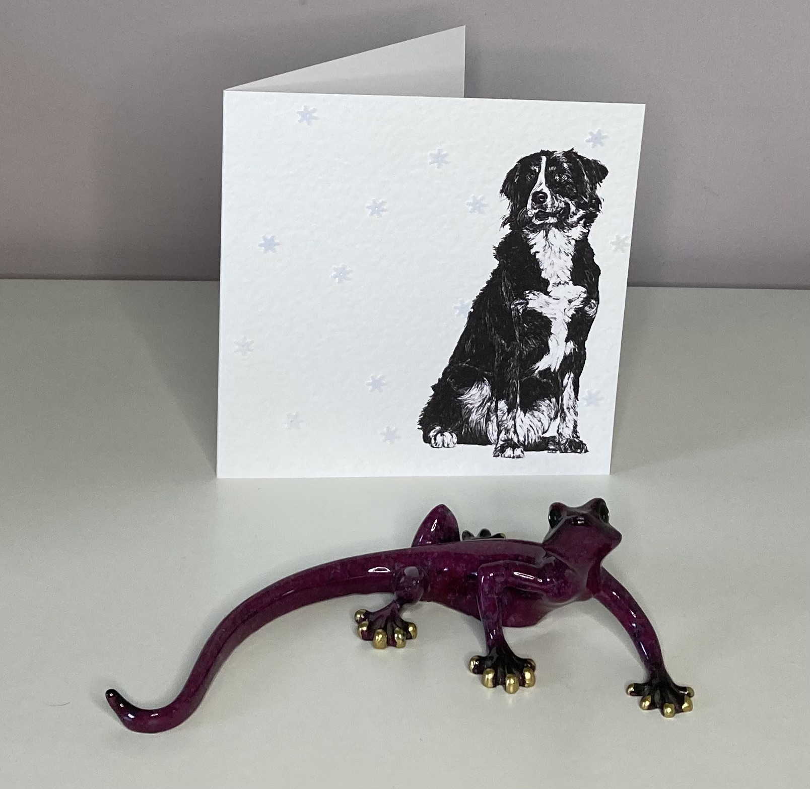 Young Bernese Mountain with snowflakes Christmas card by Louisa Hill