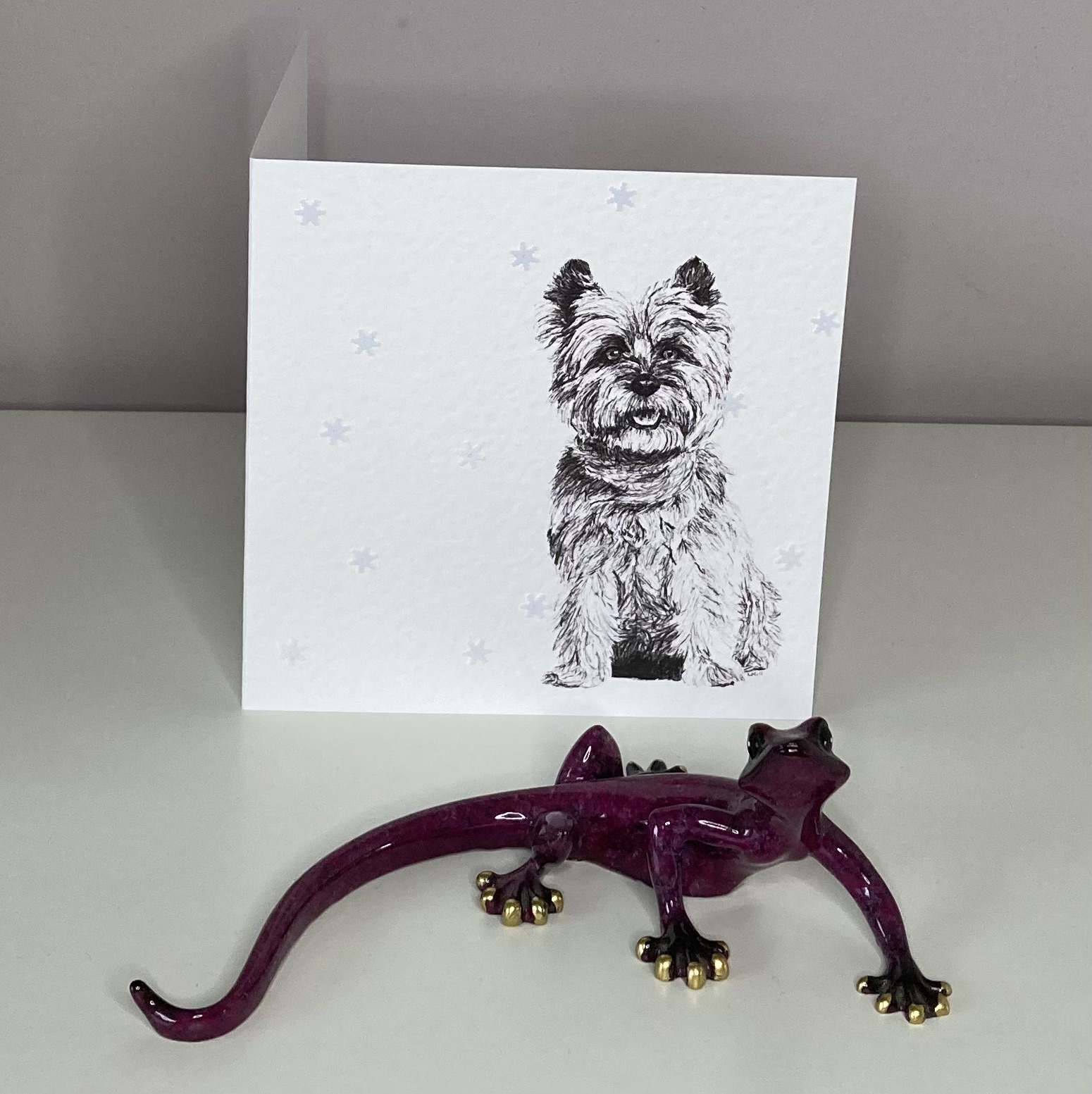 Cairn Terrier with snowflakes Christmas card by Louisa Hill