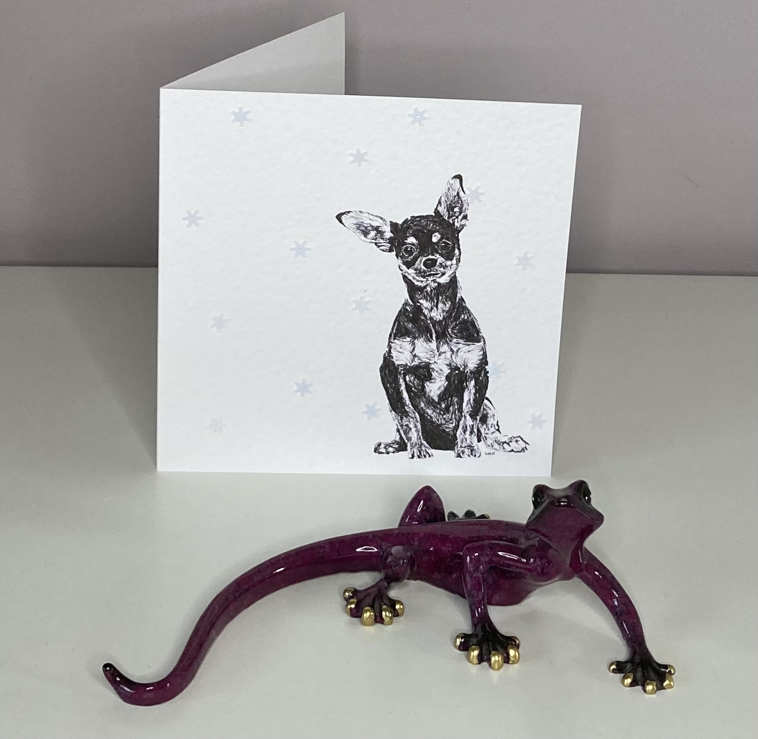 Chihuahua with snowflakes Christmas card by Louisa Hill