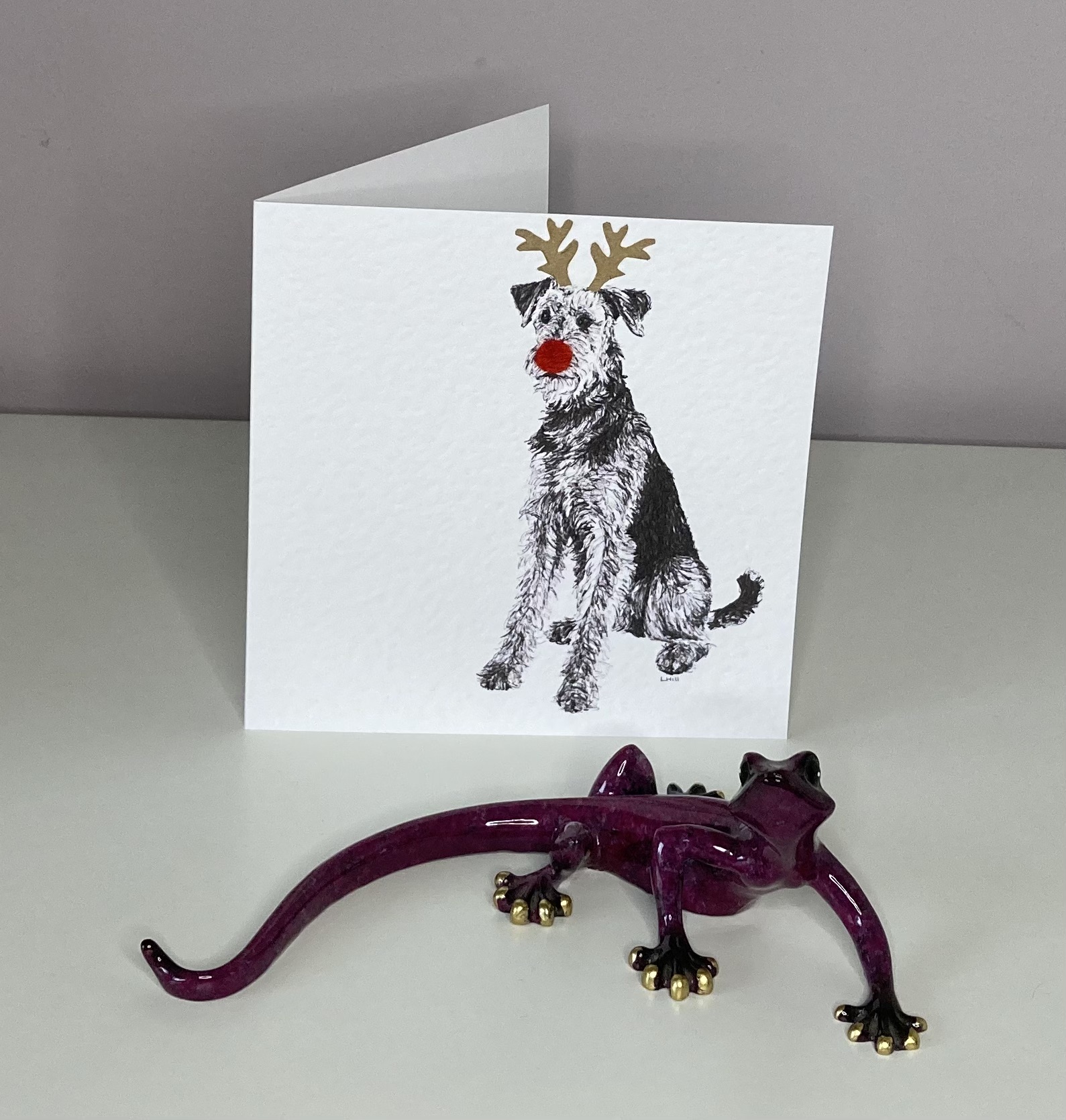 Airedale Terrier Christmas card with reindeer antlers and red nose