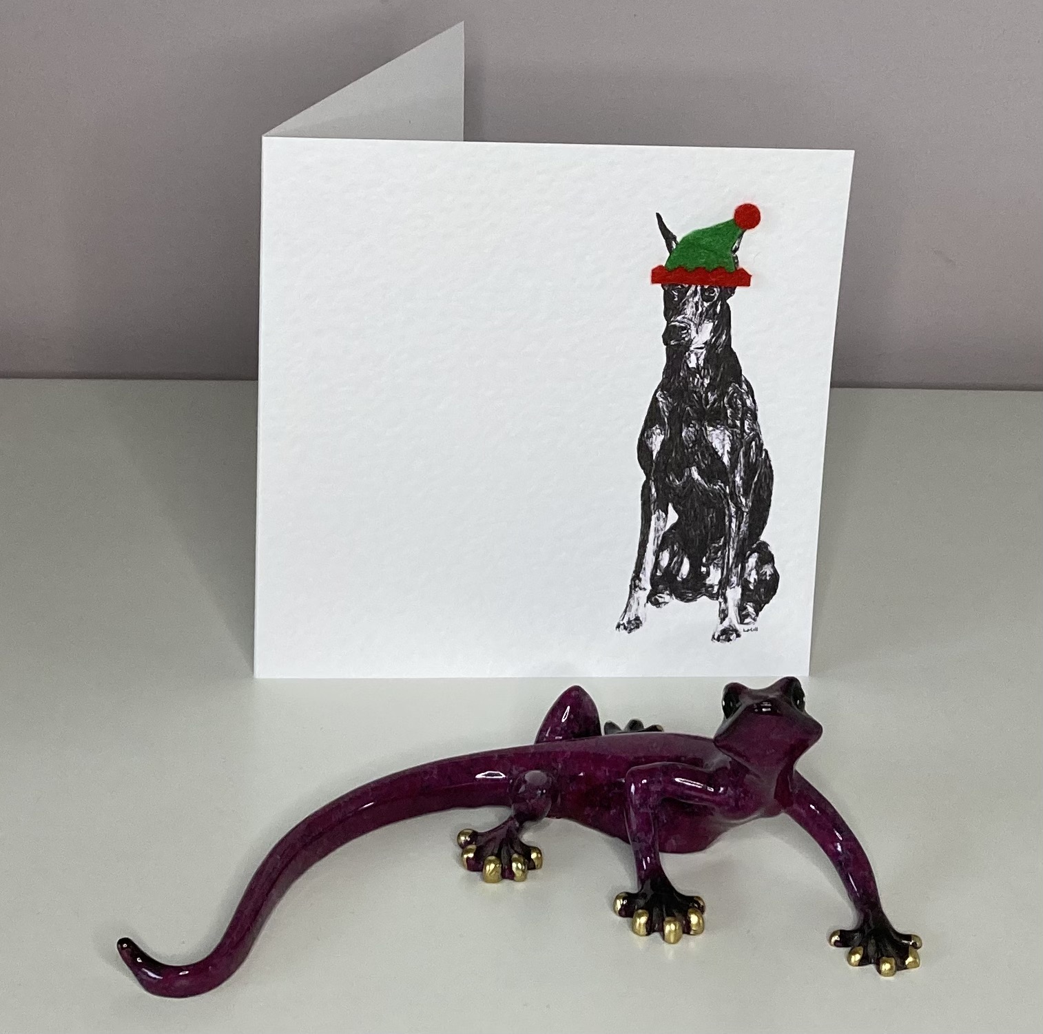 Doberman Pinscher with elf hat Christmas card by Louisa Hill