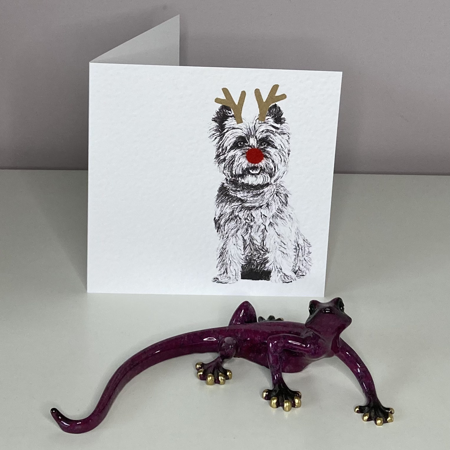 Cairn Terrier with reindeer antlers and red nose Christmas card by Louisa Hill