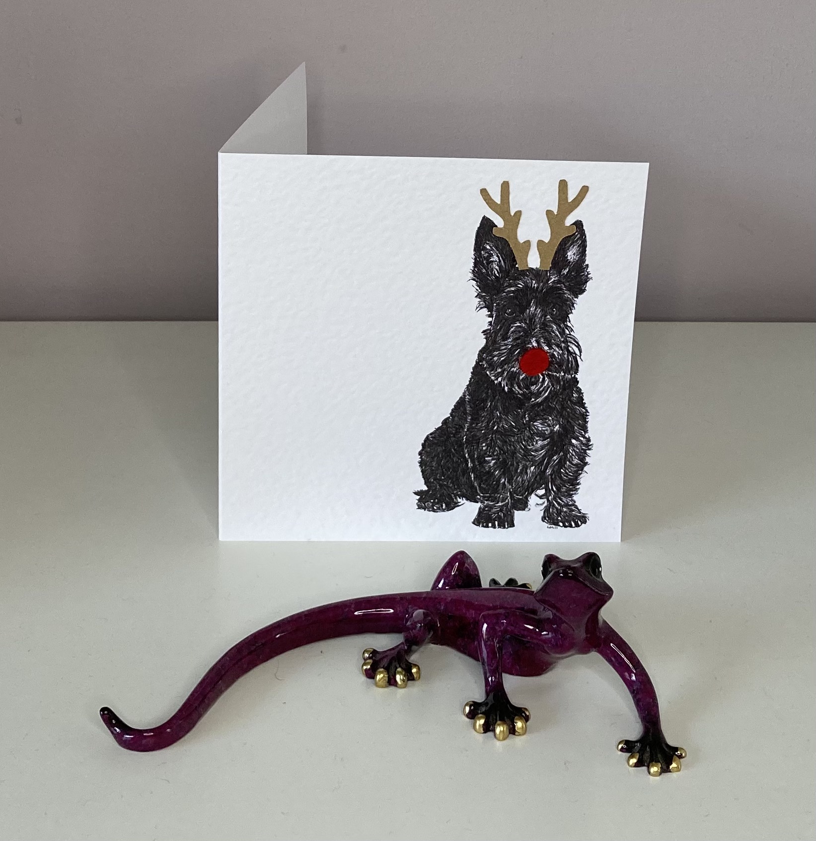 Scottish Terrier with reindeer antlers and red nose Christmas card by Louisa Hill