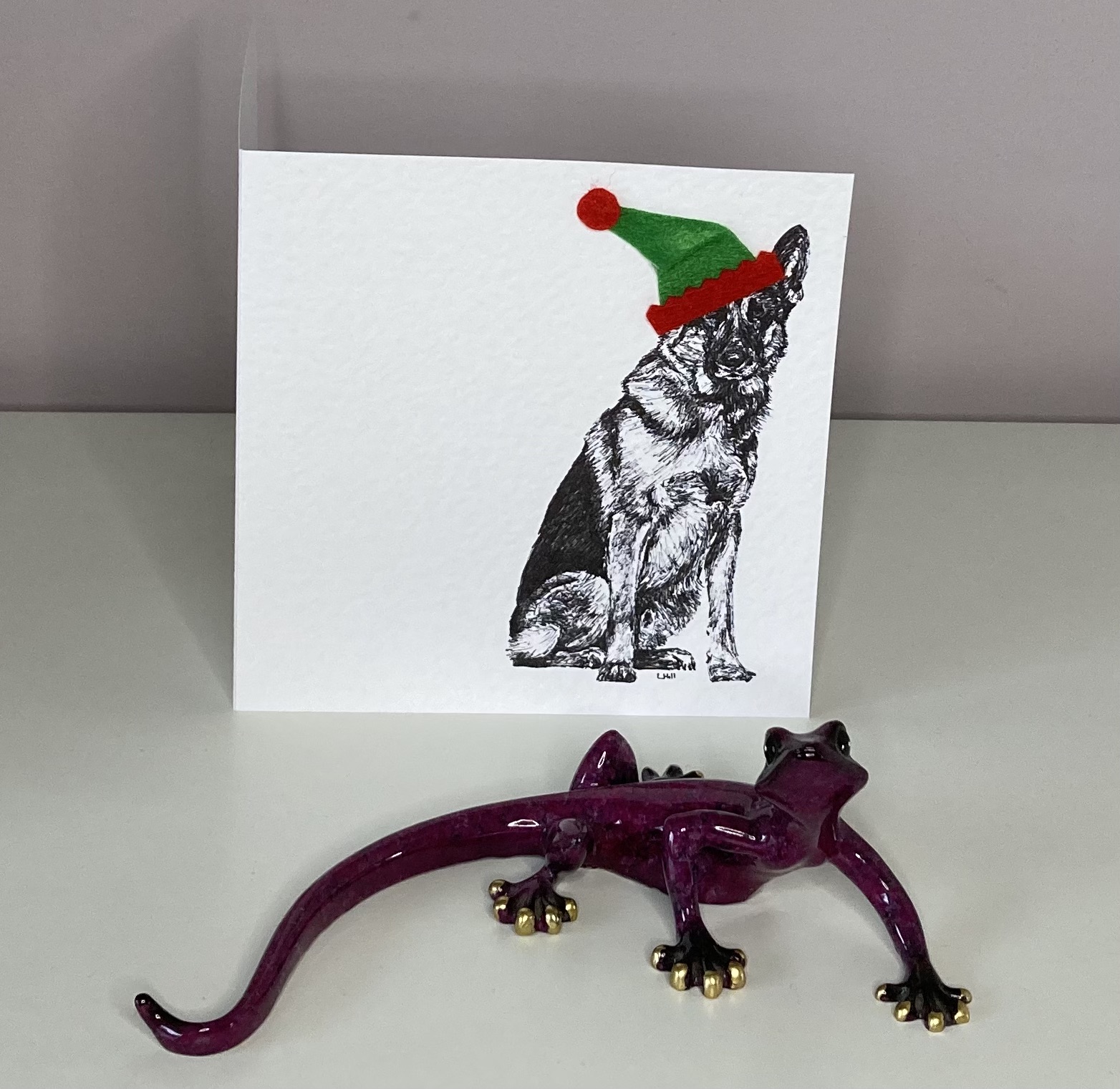 German Shepherd with elf hat Christmas card by Louisa Hill