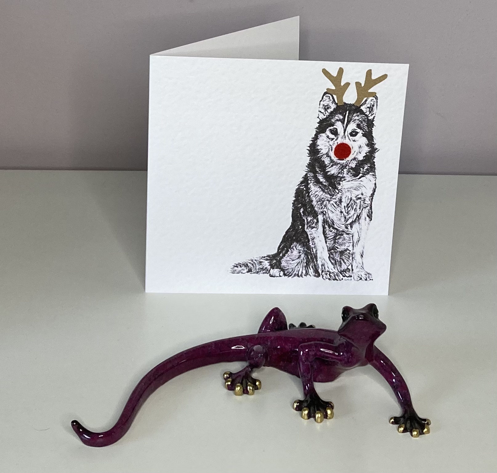 Siberian Husky with reindeer antlers and red nose Christmas card by Louisa Hill