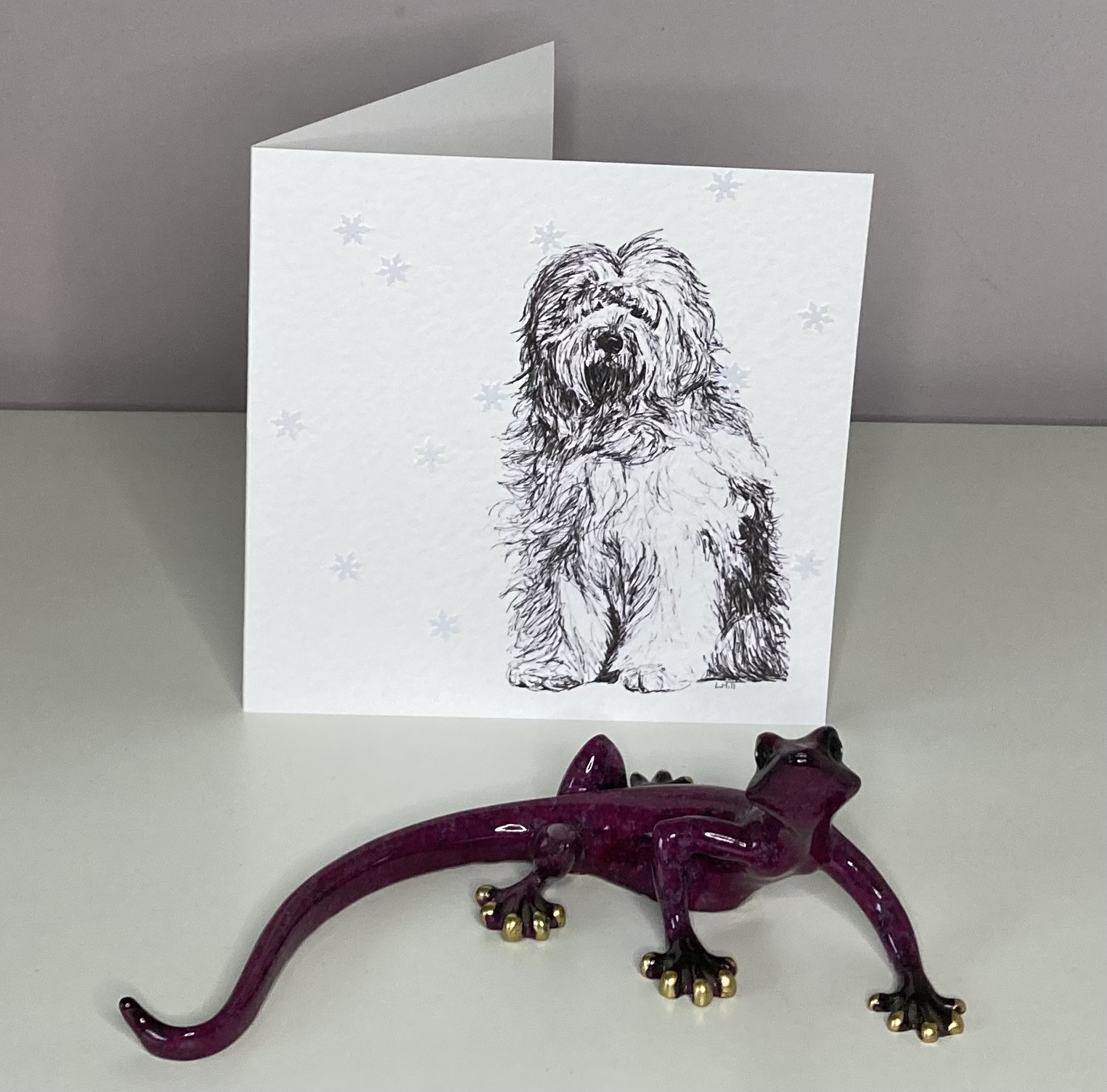 Old English Sheepdog with snowflakes Christmas card by Louisa Hill