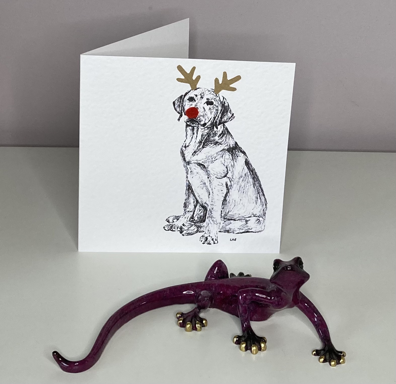 Labrador with reindeer antlers and red nose Christmas card by Louisa Hill