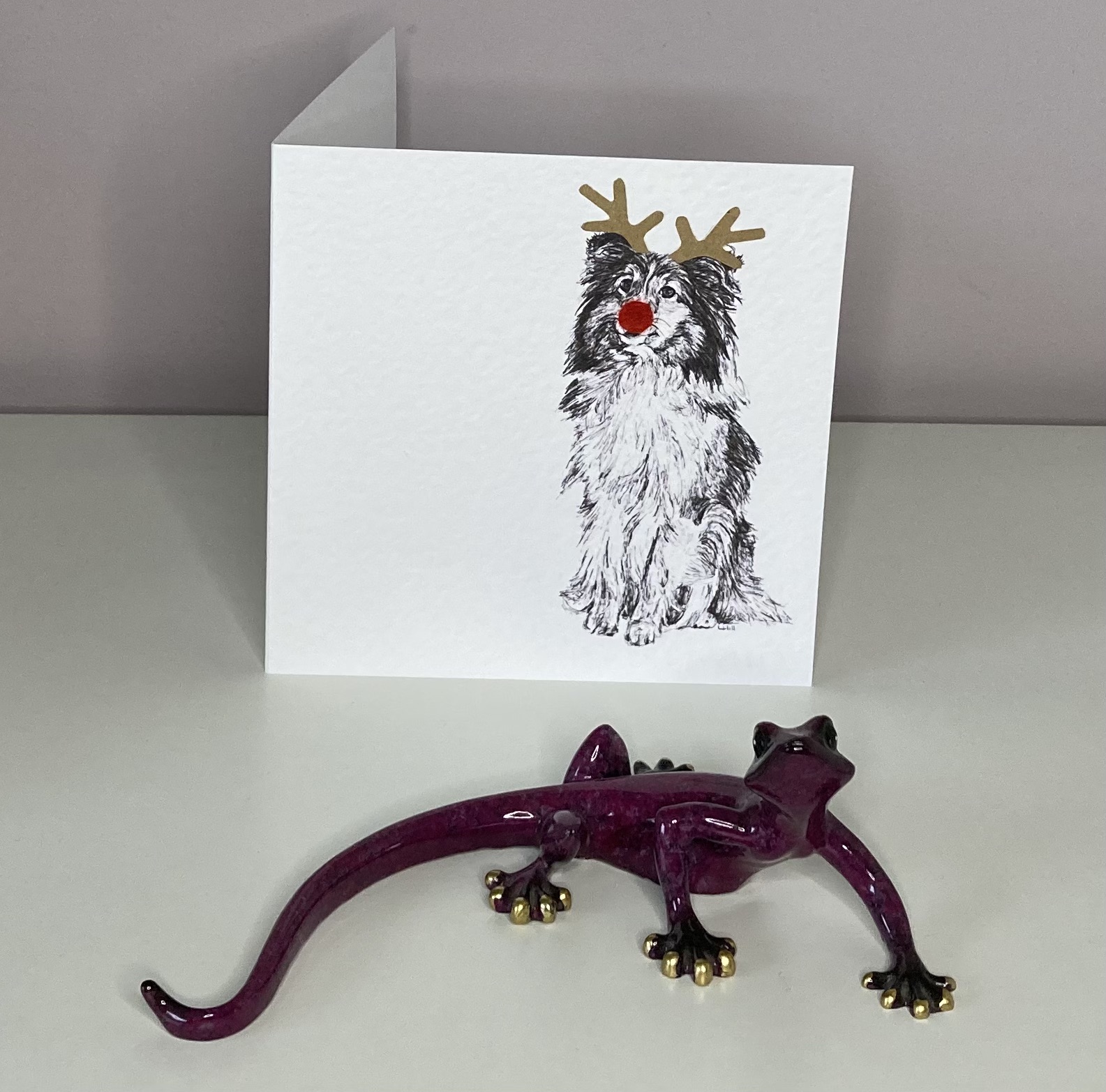 Shetland Sheepdog with reindeer antlers and red nose Christmas card by Louisa Hill