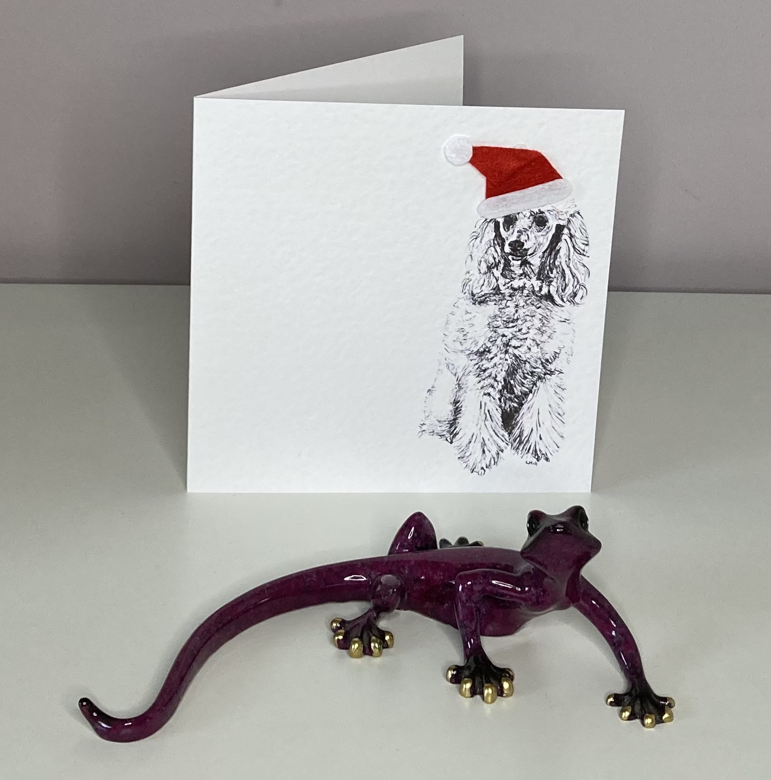 Poodle with Santa hat Christmas cards by Louisa Hill