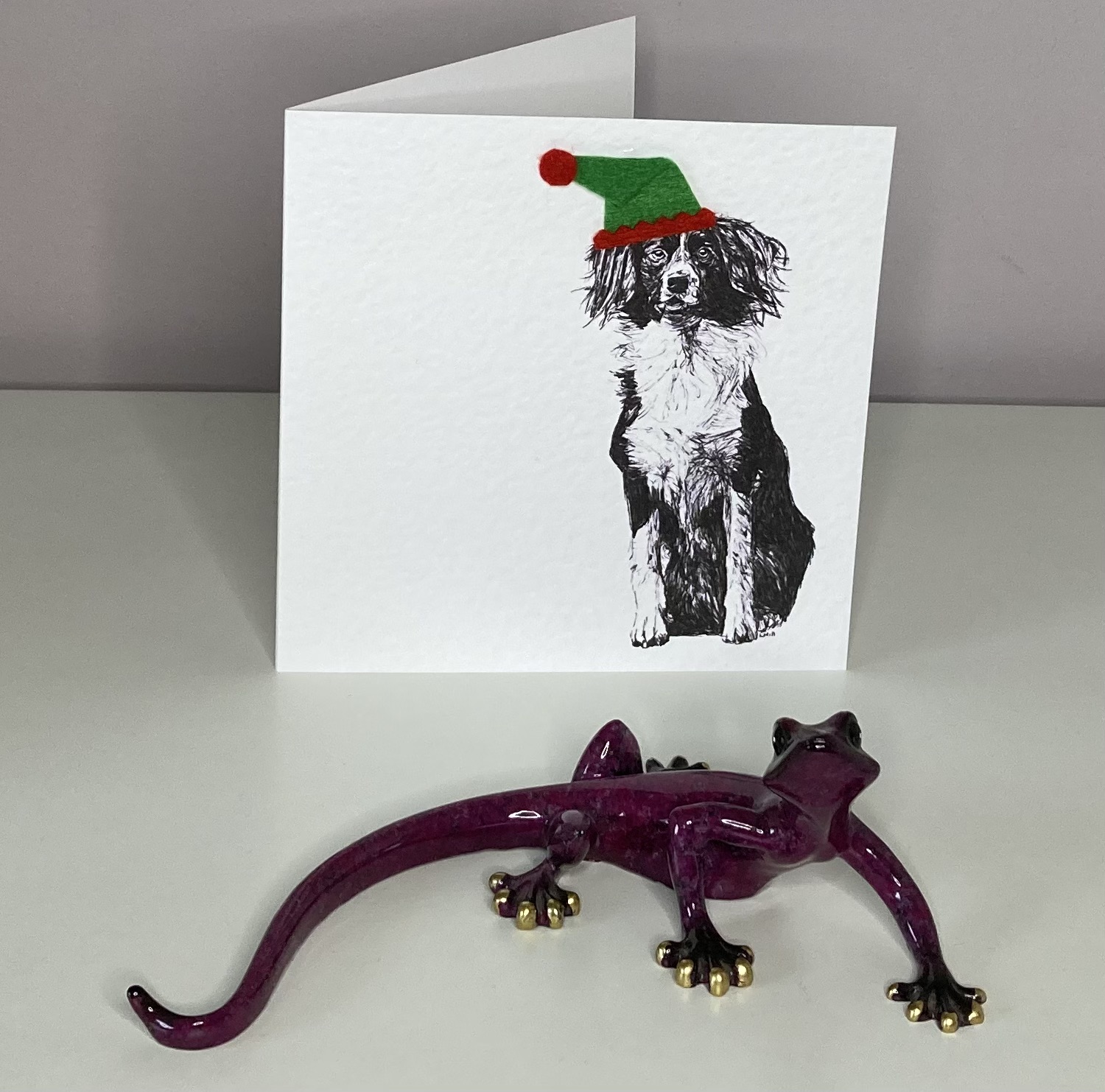 Sprollie with elf hat Christmas card by Louisa Hill