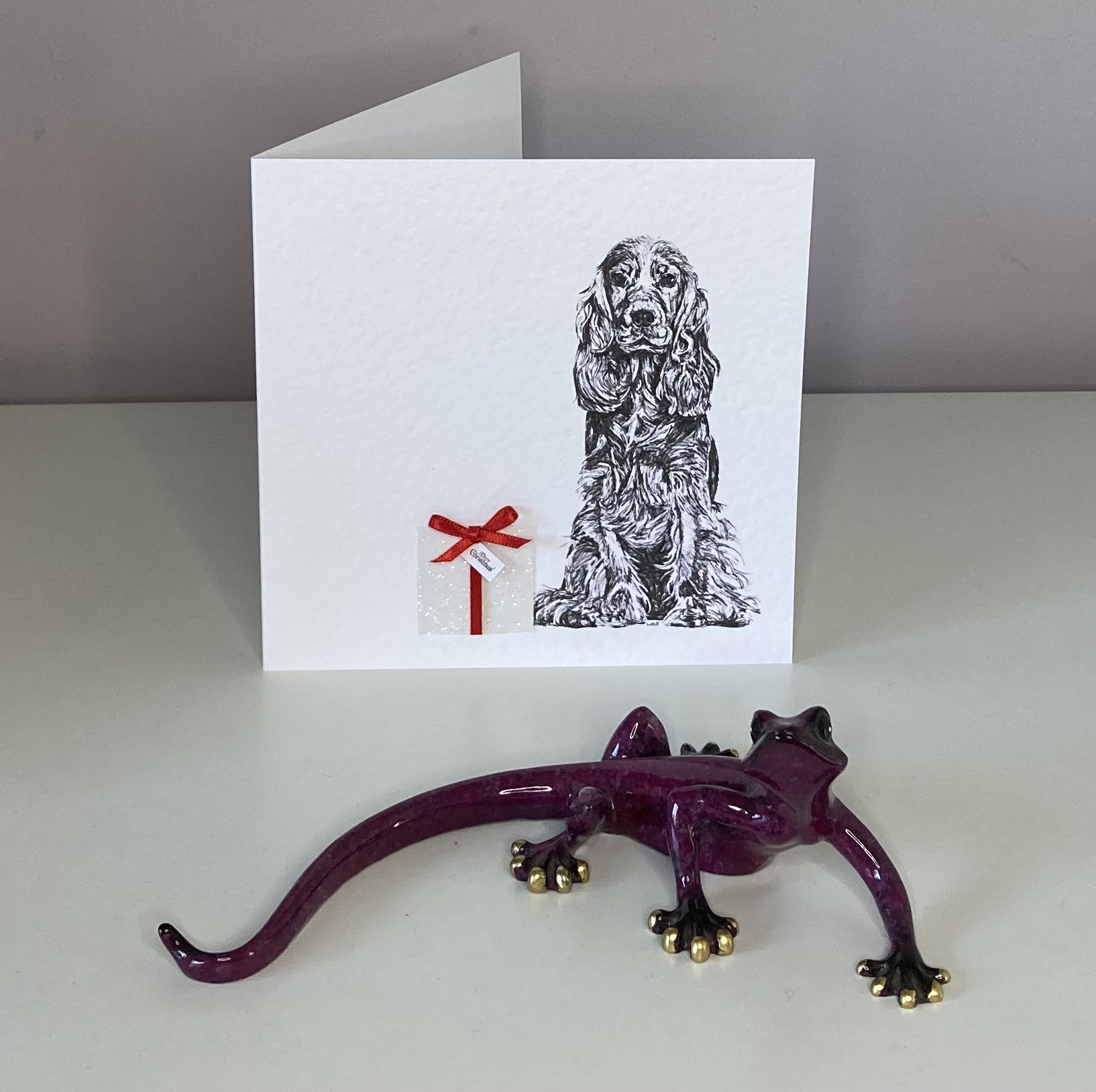 Cocker Spaniel with Christmas present Christmas card by Louisa Hill