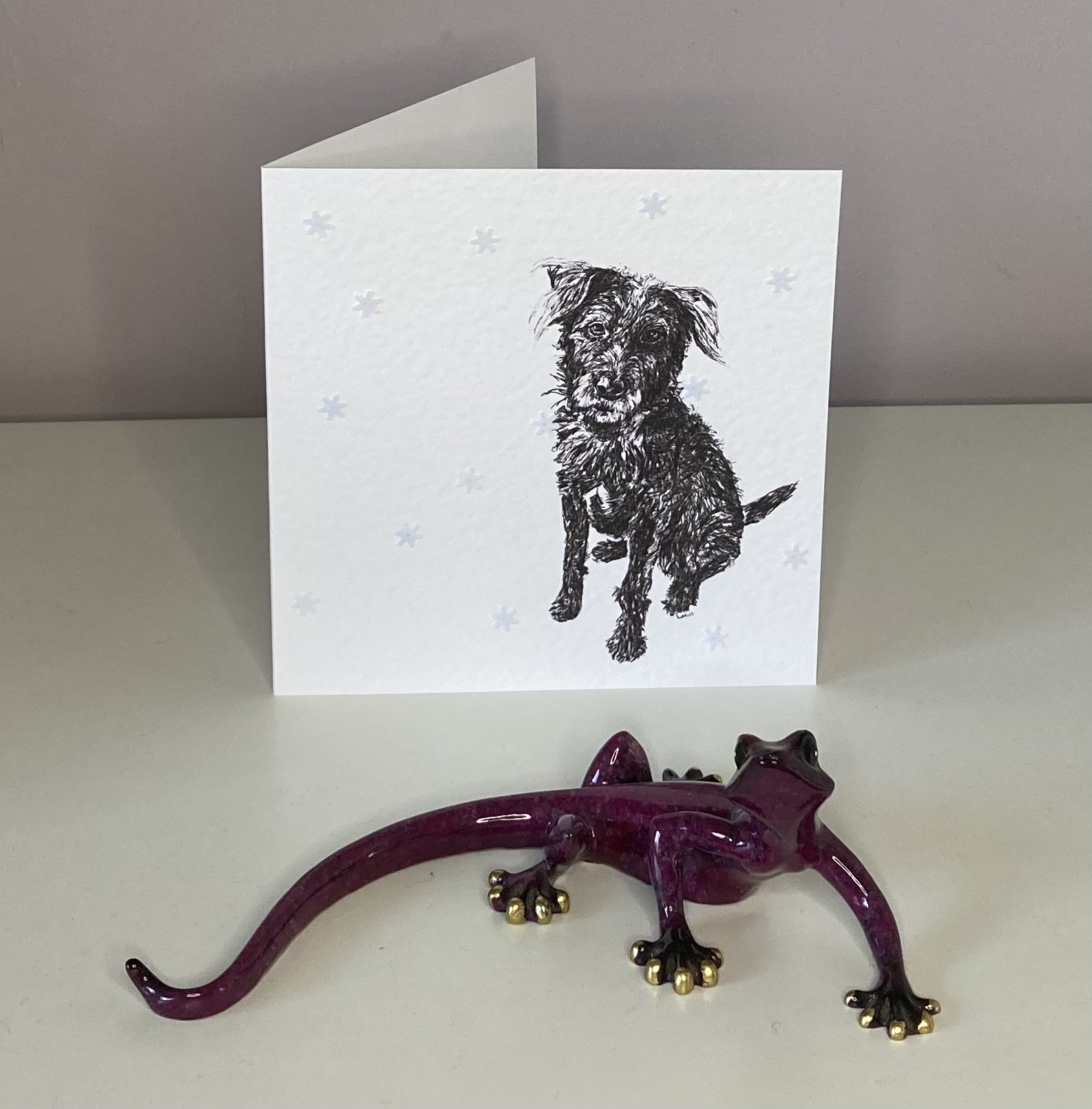 Patterdale Terrier with snowflakes Christmas card by Louisa Hill