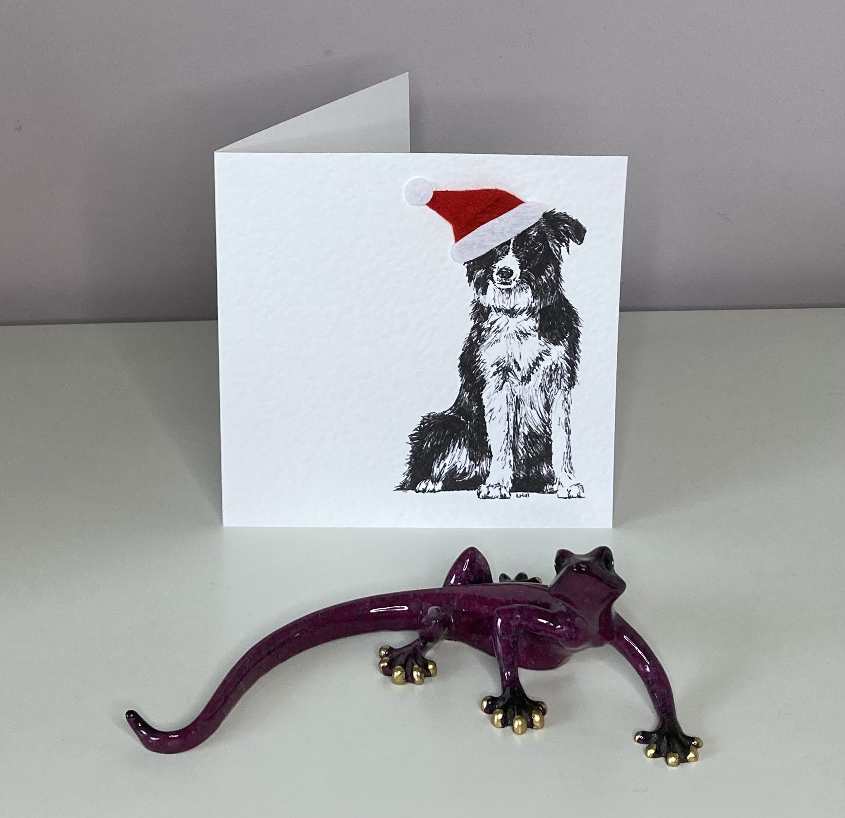 Border Collie with Santa hat Christmas card by Louisa Hill