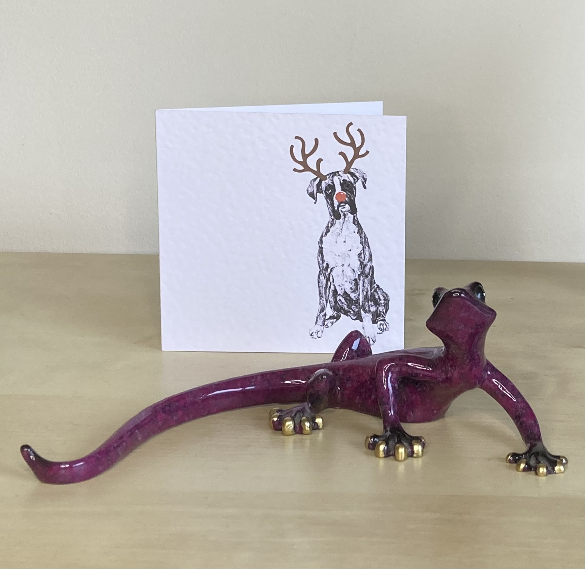 Boxer with reindeer antlers and red nose Christmas card by Louisa Hill