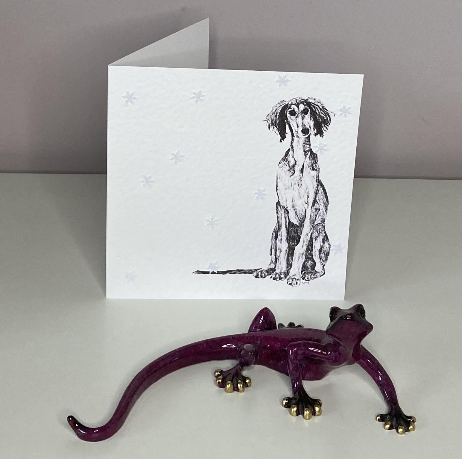 Saluki with snowflakes Christmas card by Louisa Hill