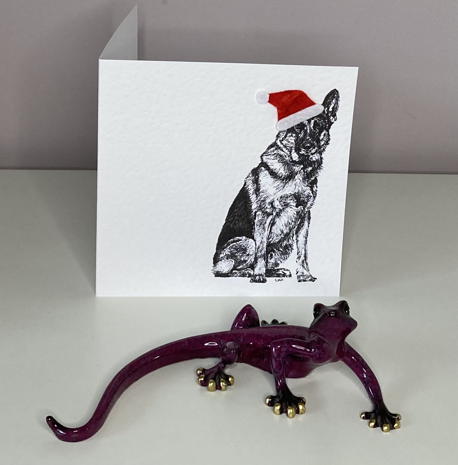 German Shepherd with Santa hat Christmas card by Louisa Hill