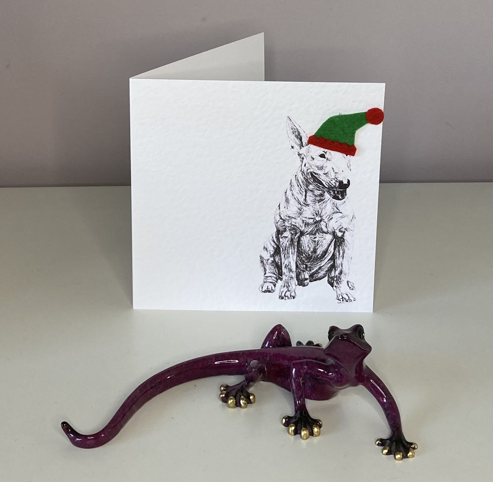 English Bull Terrier with elf hat Christmas card by Louisa Hill