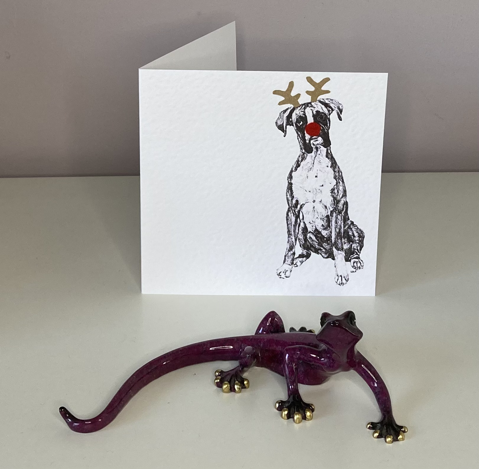 Boxer with reindeer antlers and red nose Christmas card by Louisa Hill