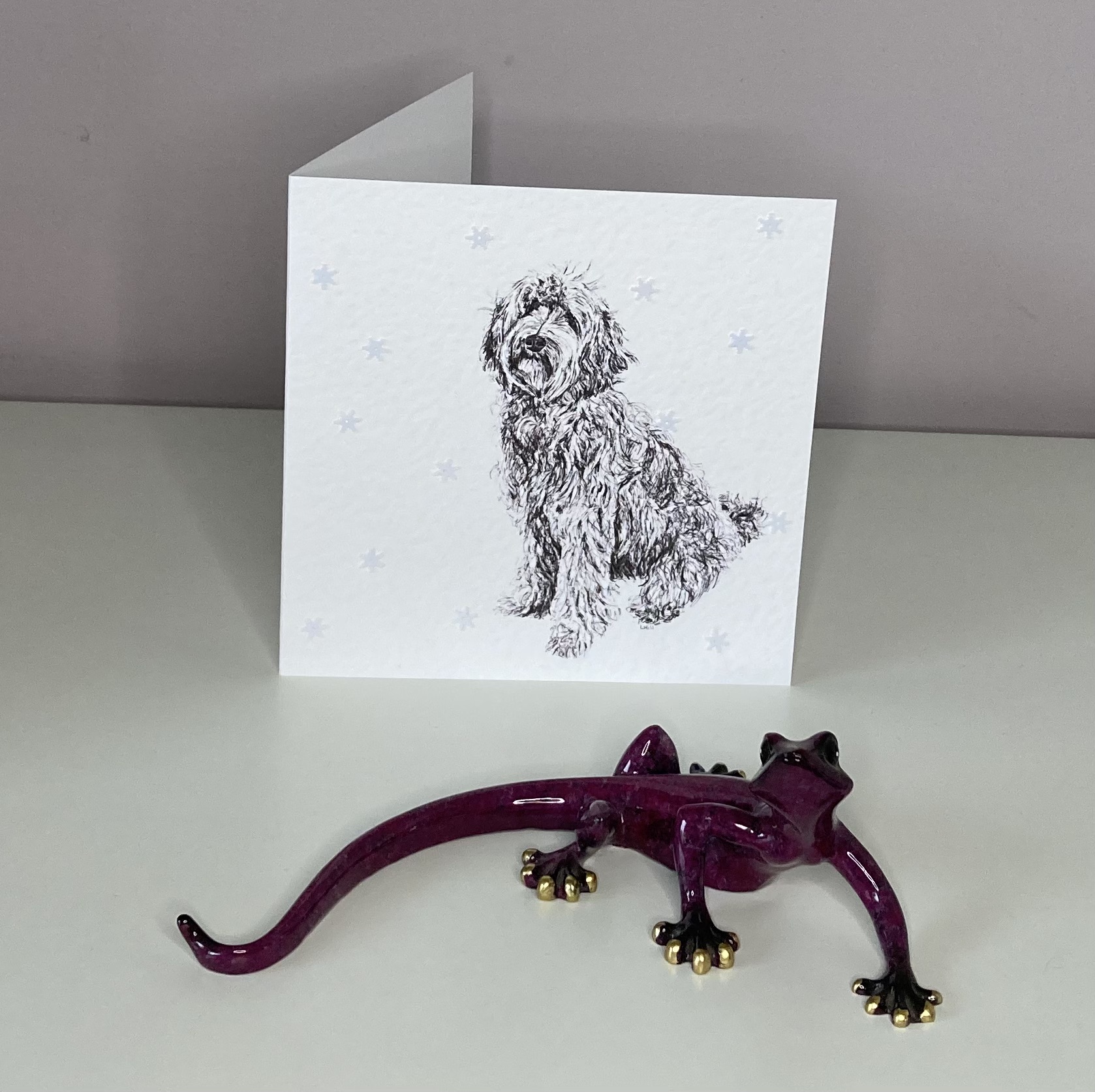 Ladradoodle with snowflakes Christmas card by Louisa Hill