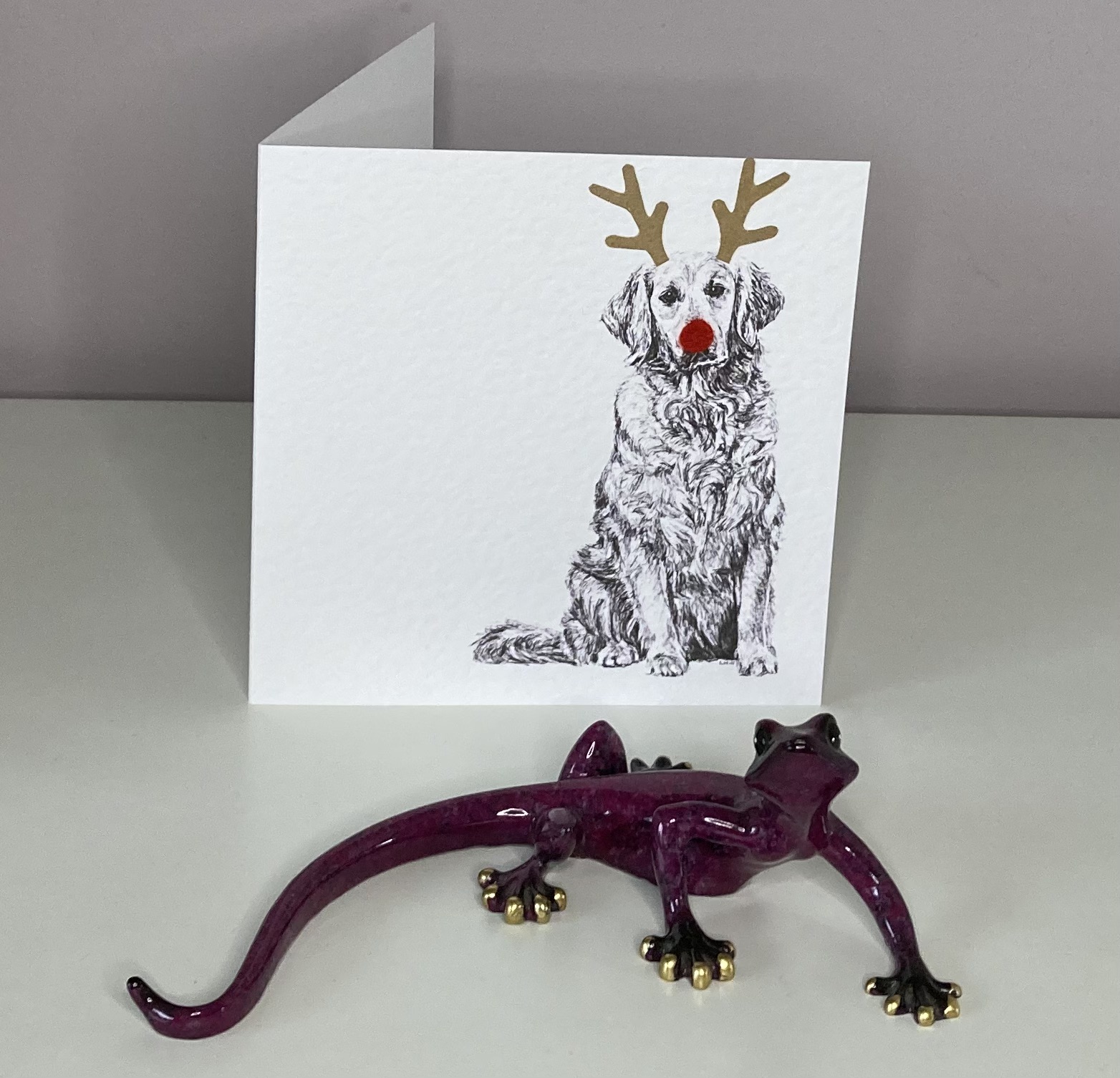 Golden Retriever with reindeer antlers and red nose Christmas card by Louisa Hill