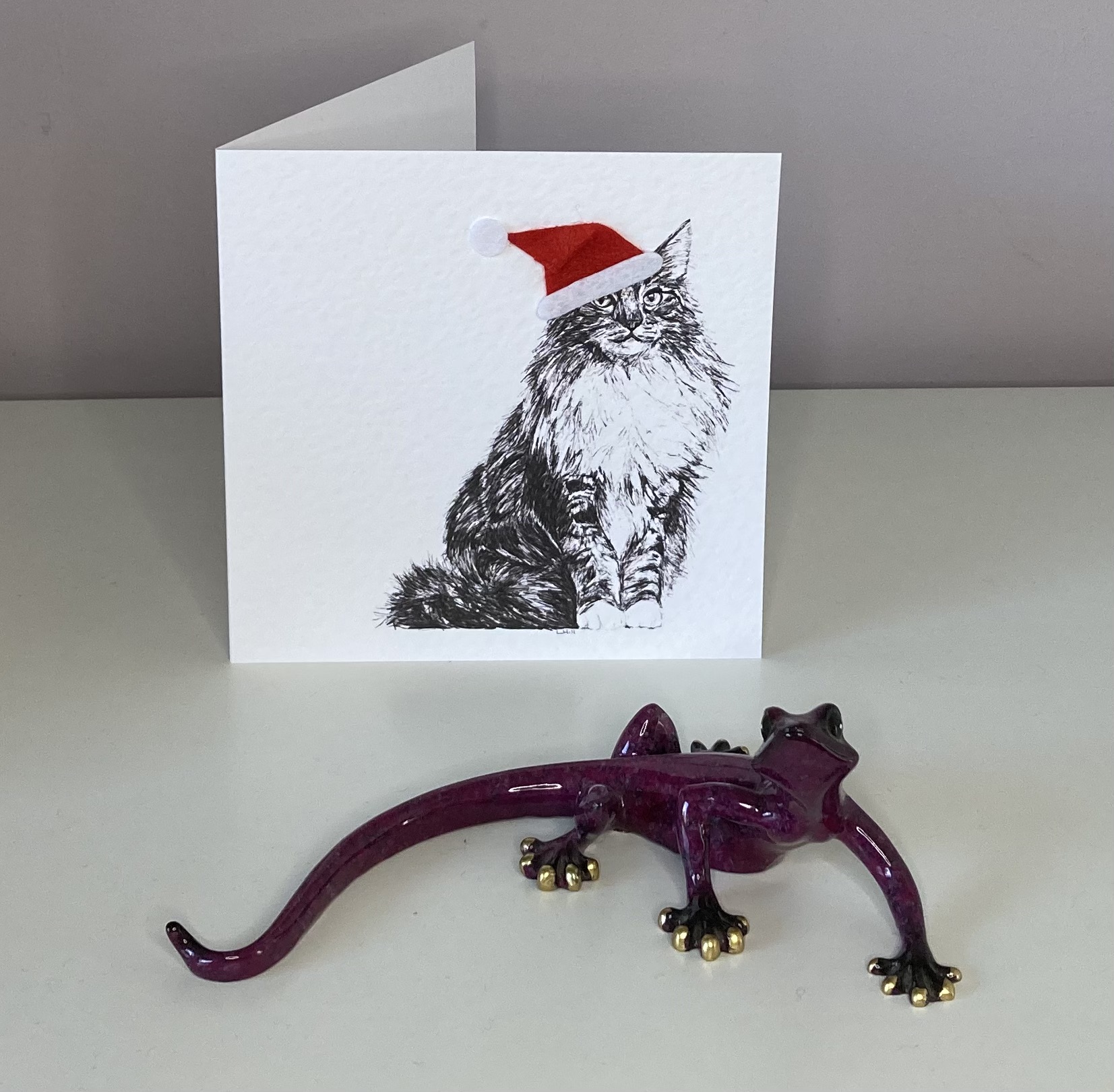 Norwegian Forest with Santa hat Christmas card by Louisa Hill