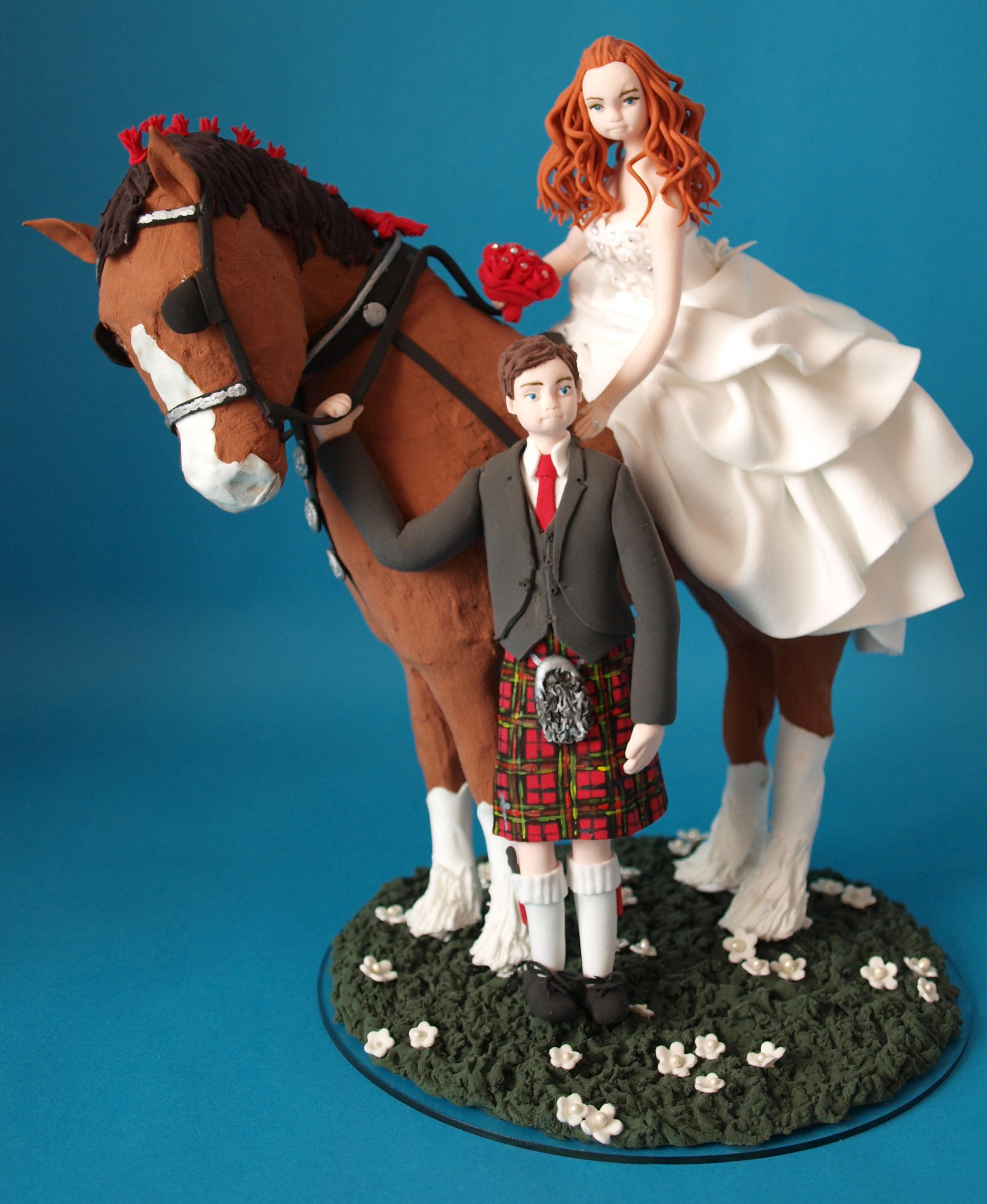 Scottish bride and groom in kilt with shire horse wedding cake topper by Louisa Hill