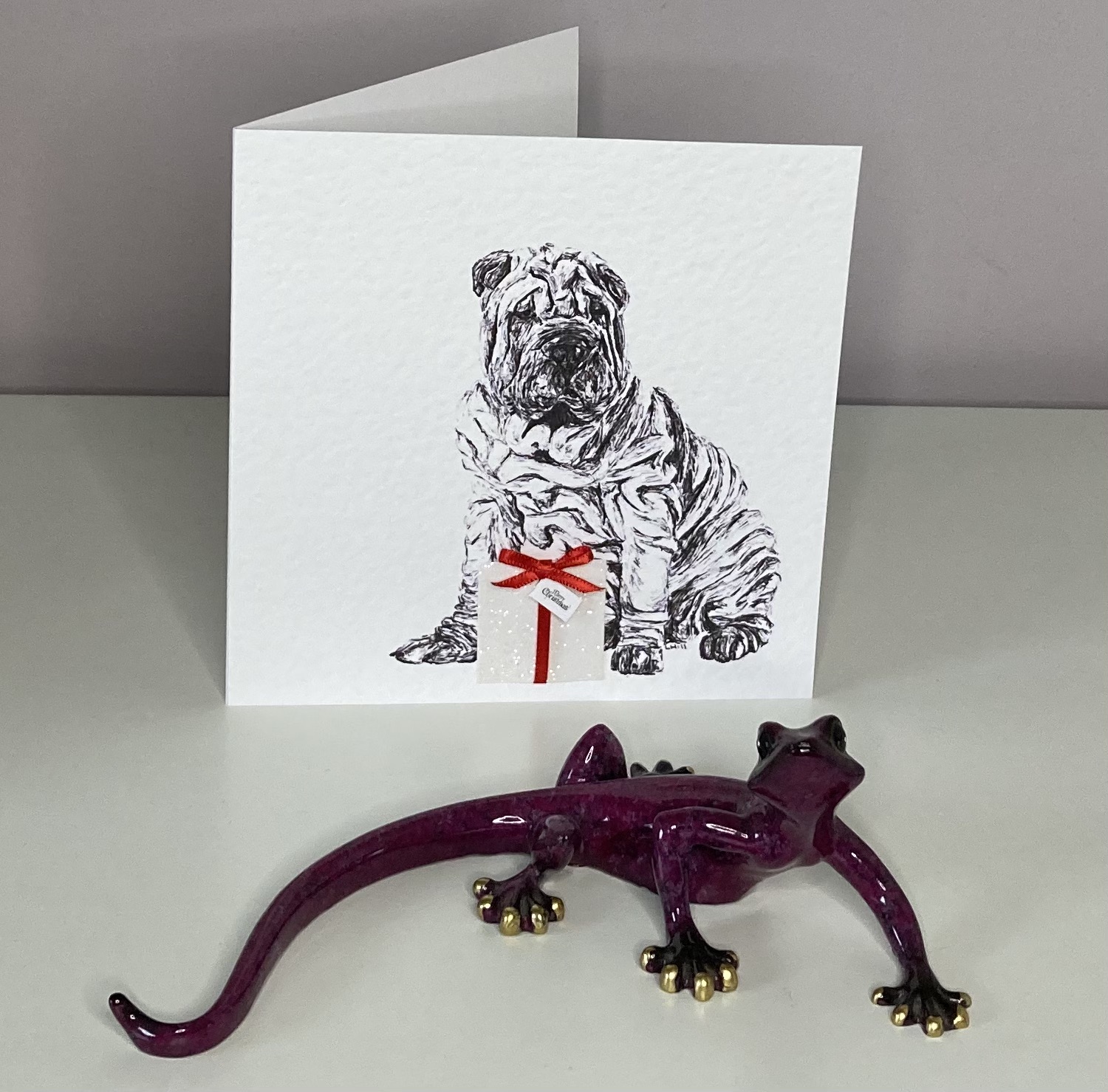 Shar Pei with Christmas present Christmas card by Louisa Hill