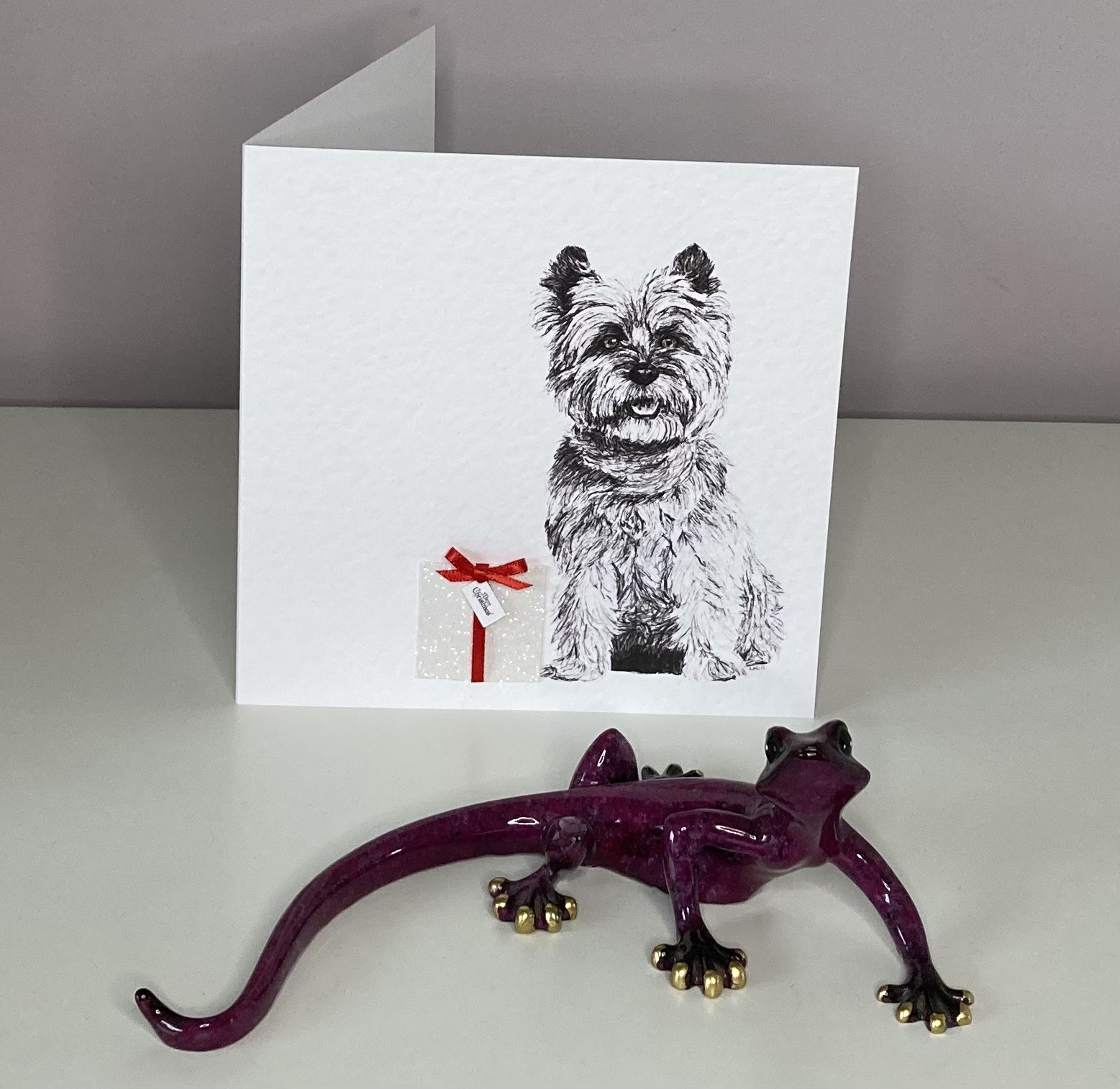 Cairn Terrier with Christmas card Christmas card by Louisa Hill